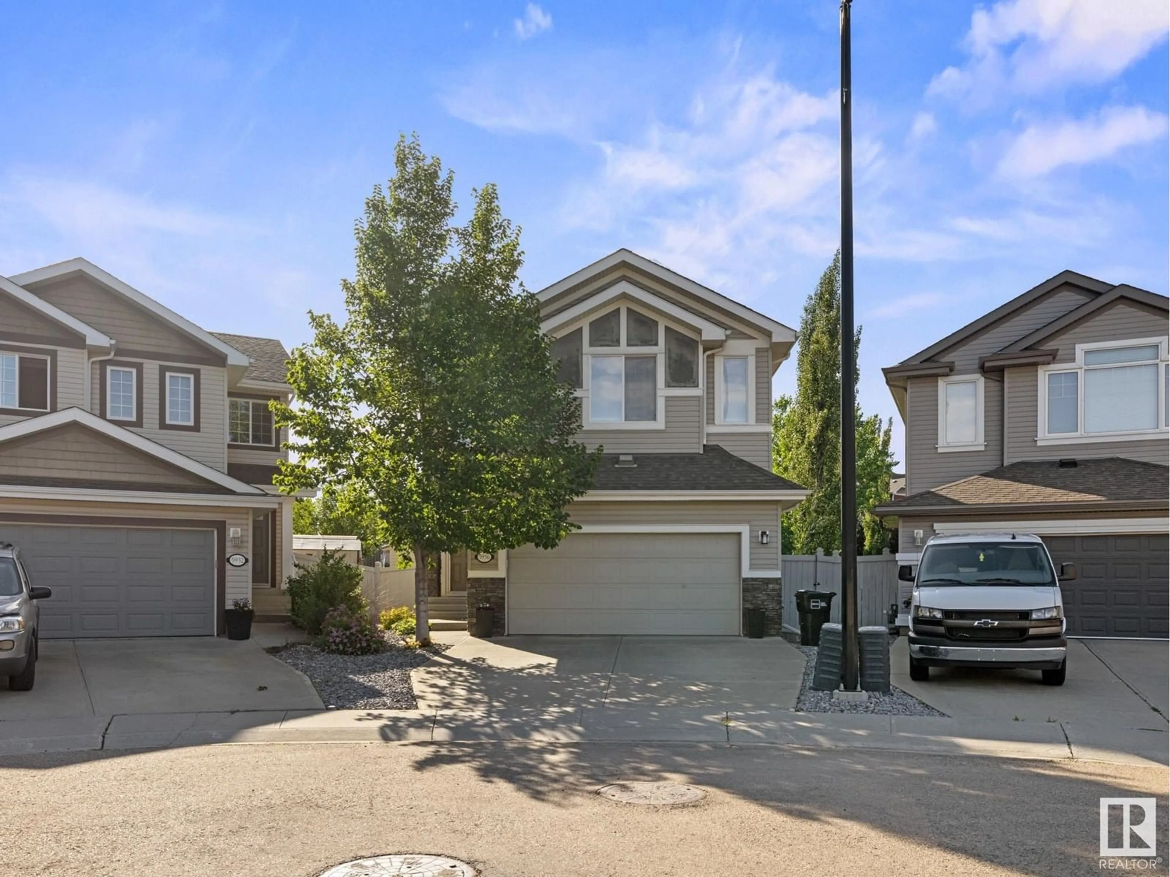 A pic from outside/outdoor area/front of a property/back of a property/a pic from drone, street for 5936 208 ST, Edmonton Alberta T6M0M1