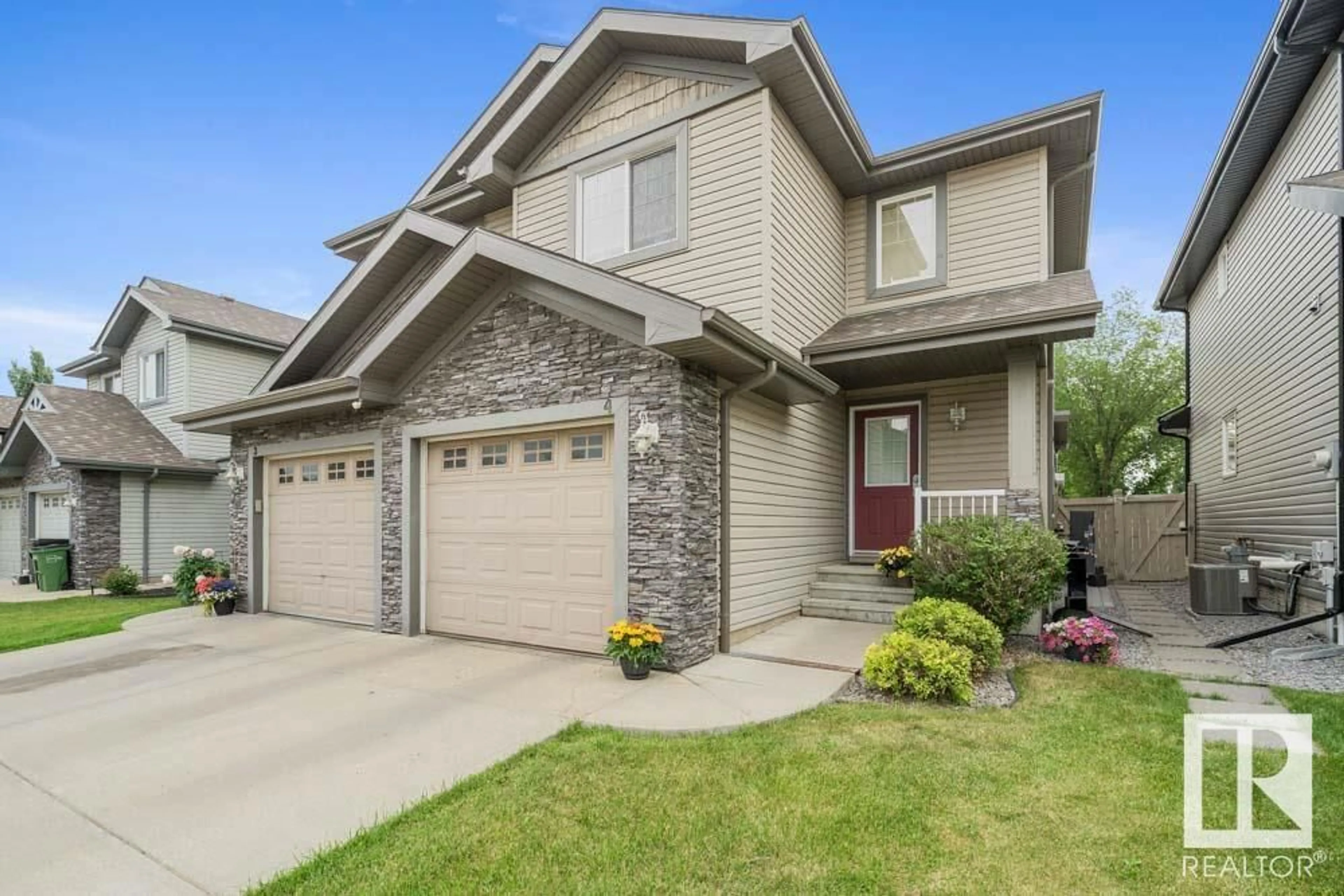 Home with vinyl exterior material, street for #4 - 1730 LEGER GATE, Edmonton Alberta T6R0R3