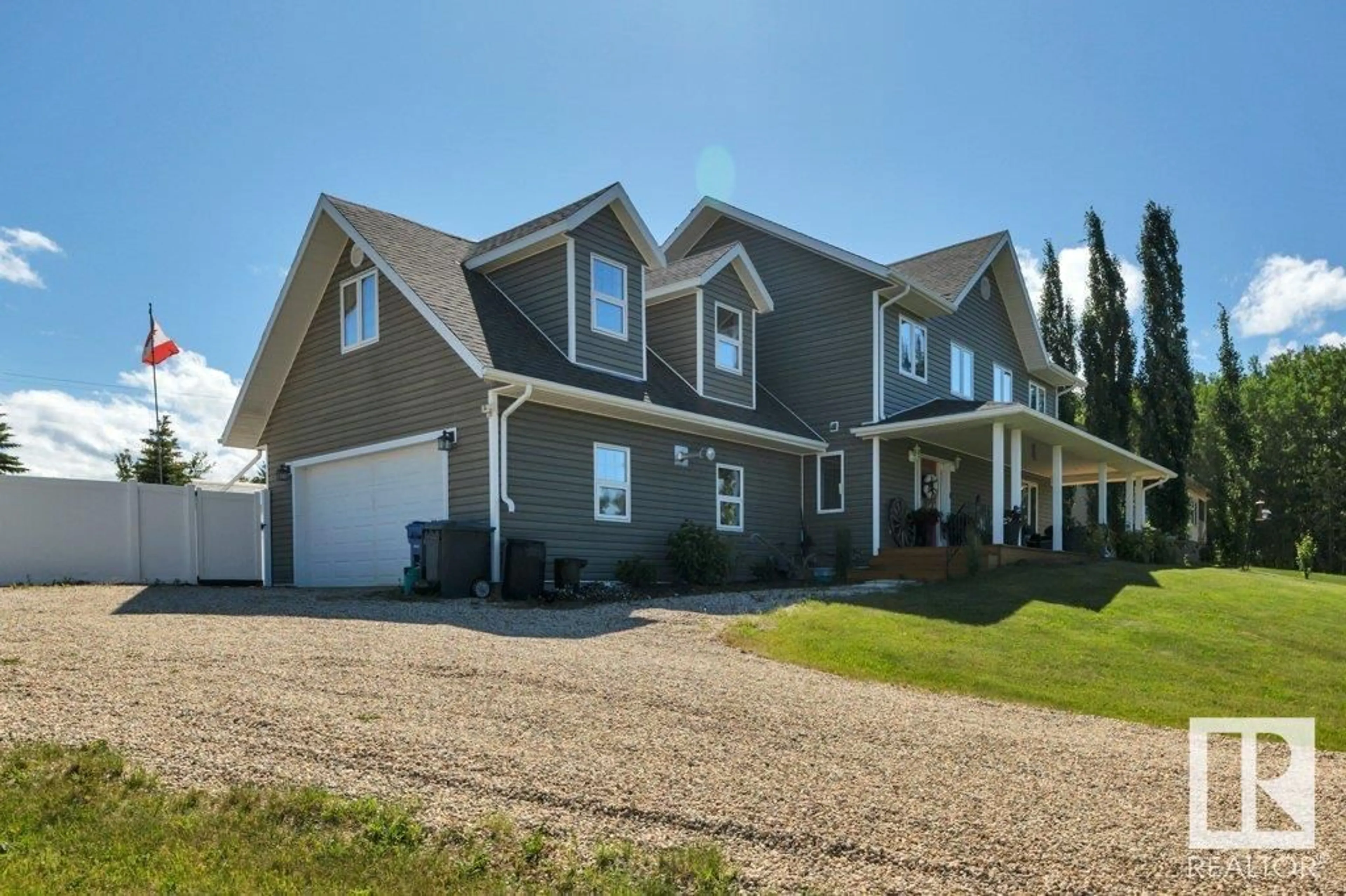 Home with vinyl exterior material, street for 420 462014 RGE ROAD 10, Rural Wetaskiwin County Alberta T0C2V0