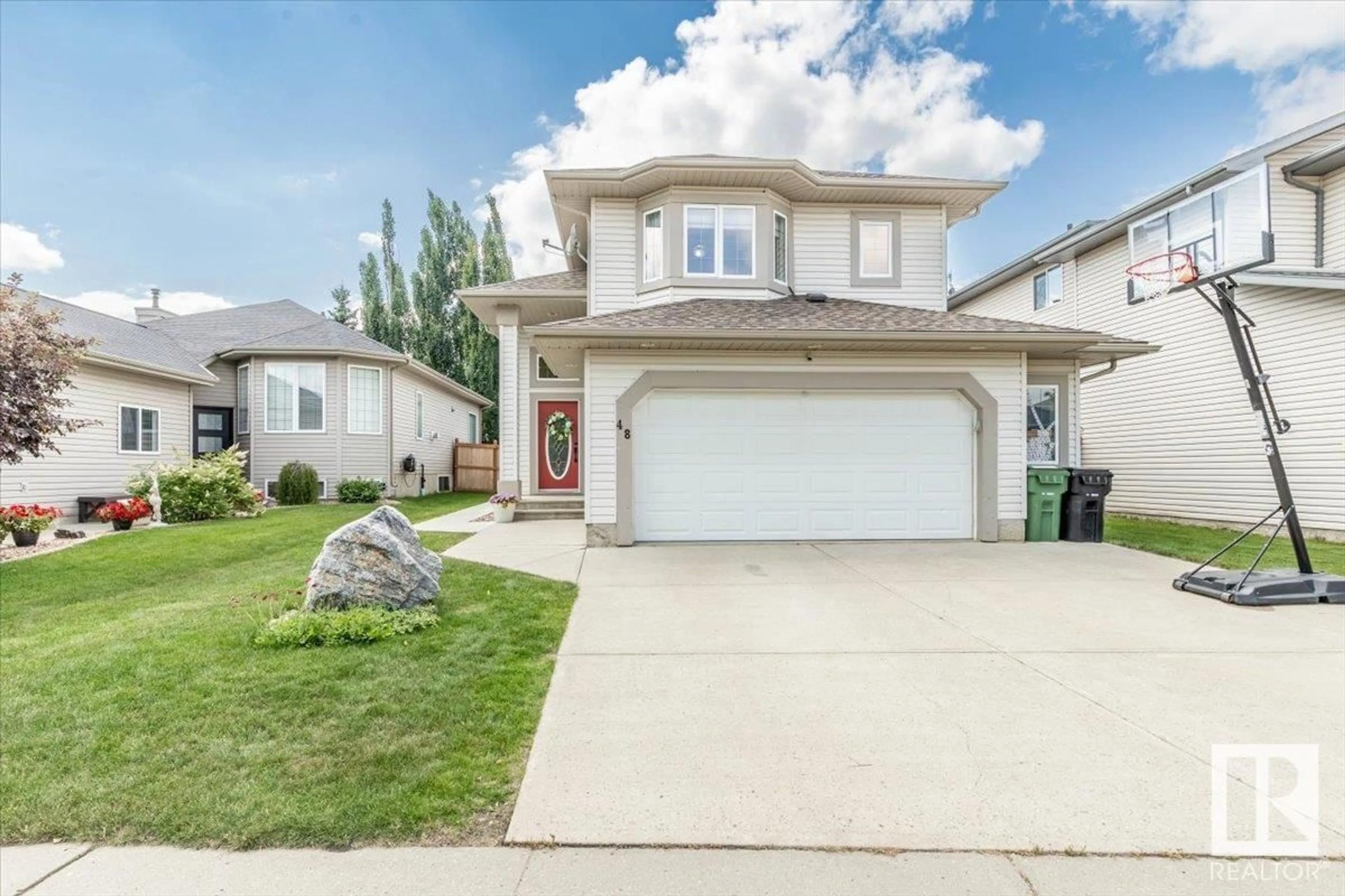 Home with vinyl exterior material, street for 48 WILLIS CR, Leduc Alberta T9E8H4