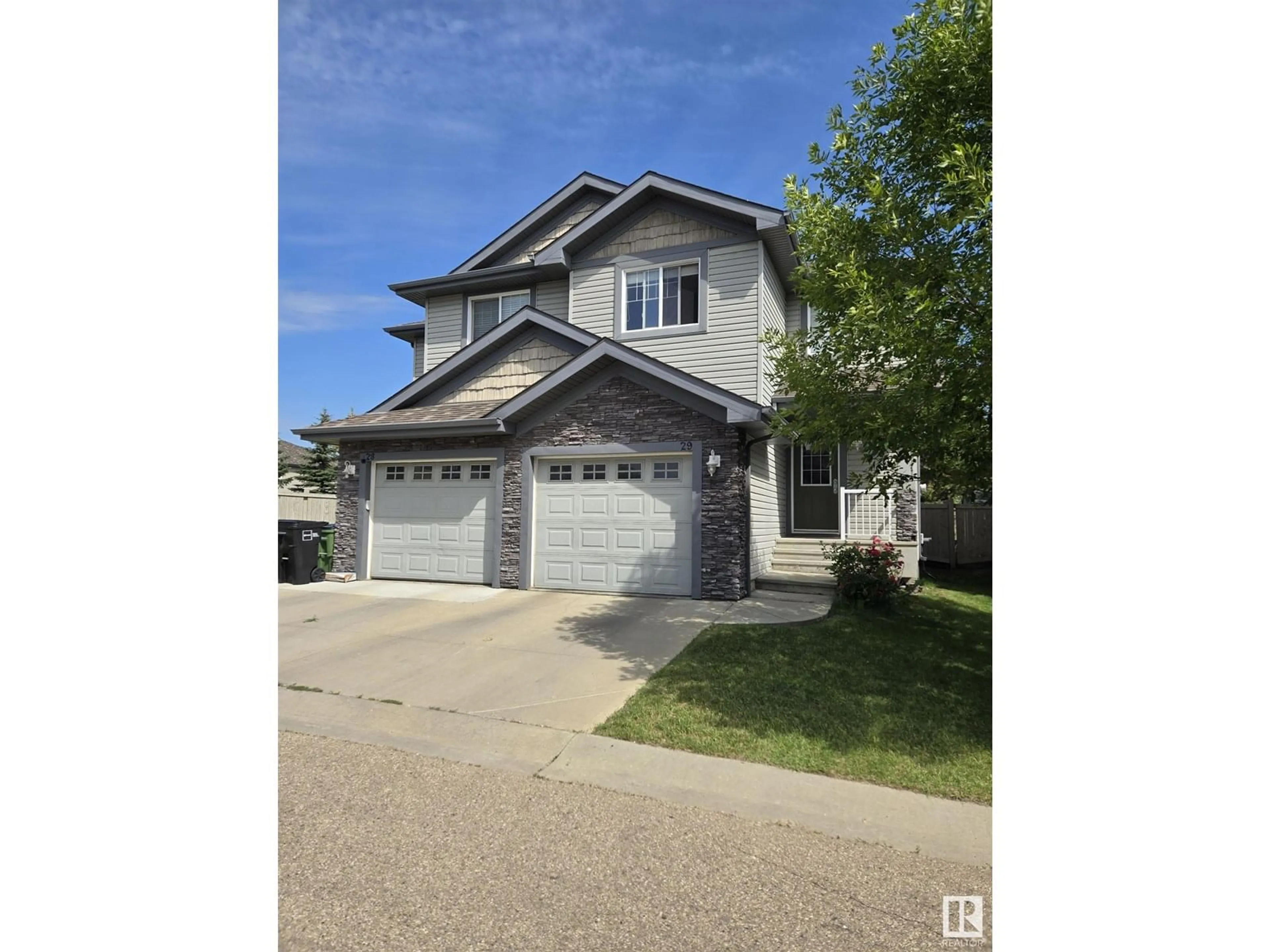Home with vinyl exterior material, street for #29 - 1730 LEGER GATE NW, Edmonton Alberta T6R0R3
