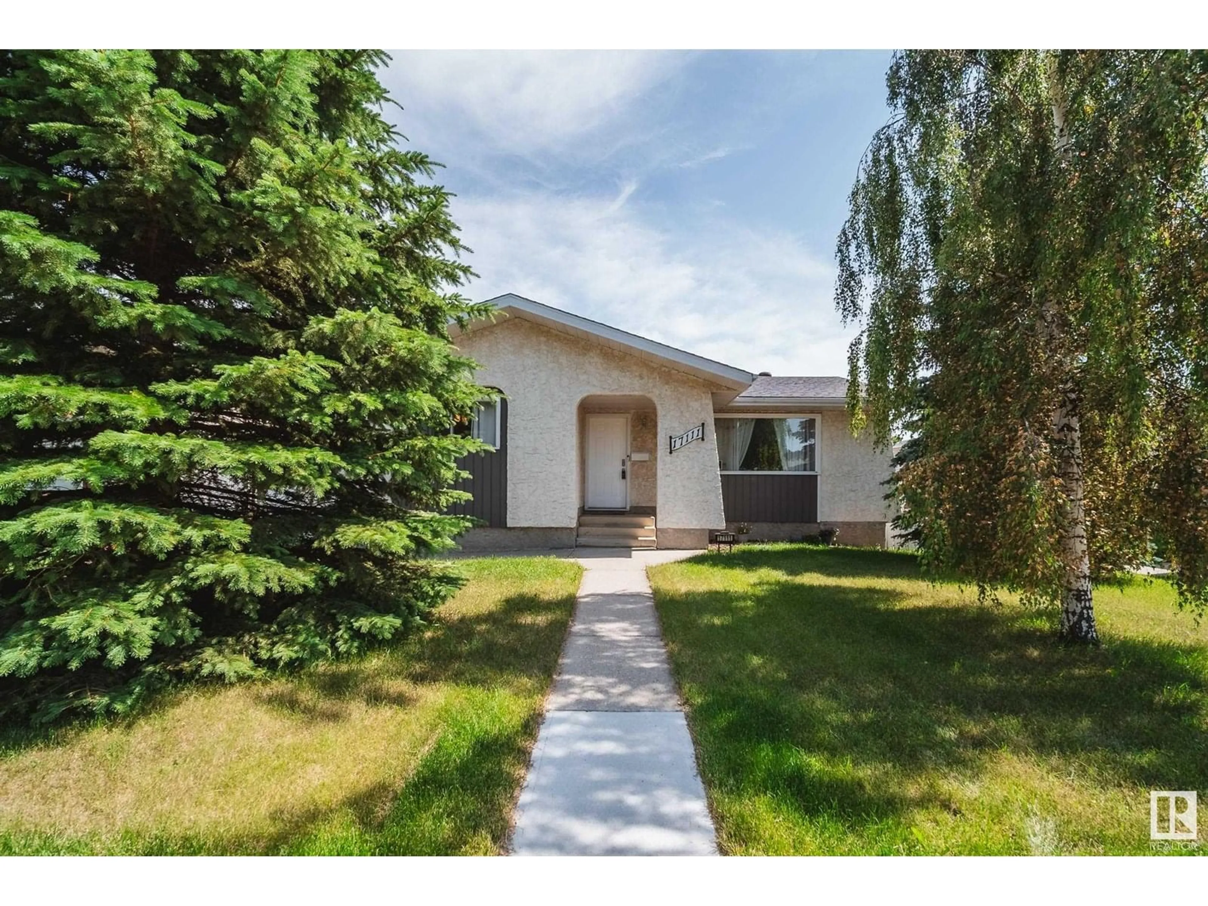 Home with vinyl exterior material, street for 17111 110 ST, Edmonton Alberta T5X3B4