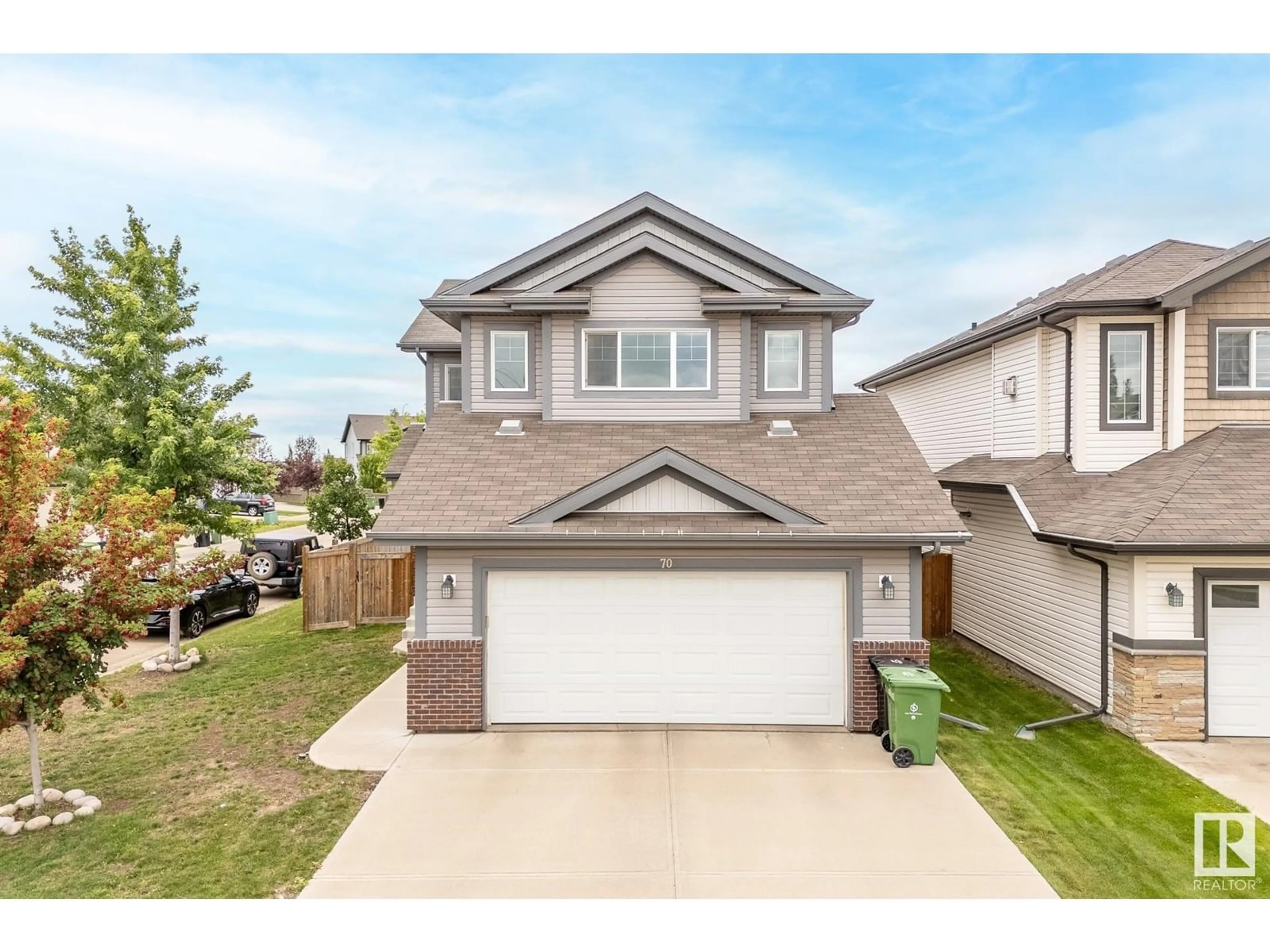 Home with vinyl exterior material, street for 70 NAVAJO LN, Fort Saskatchewan Alberta T8L0K6
