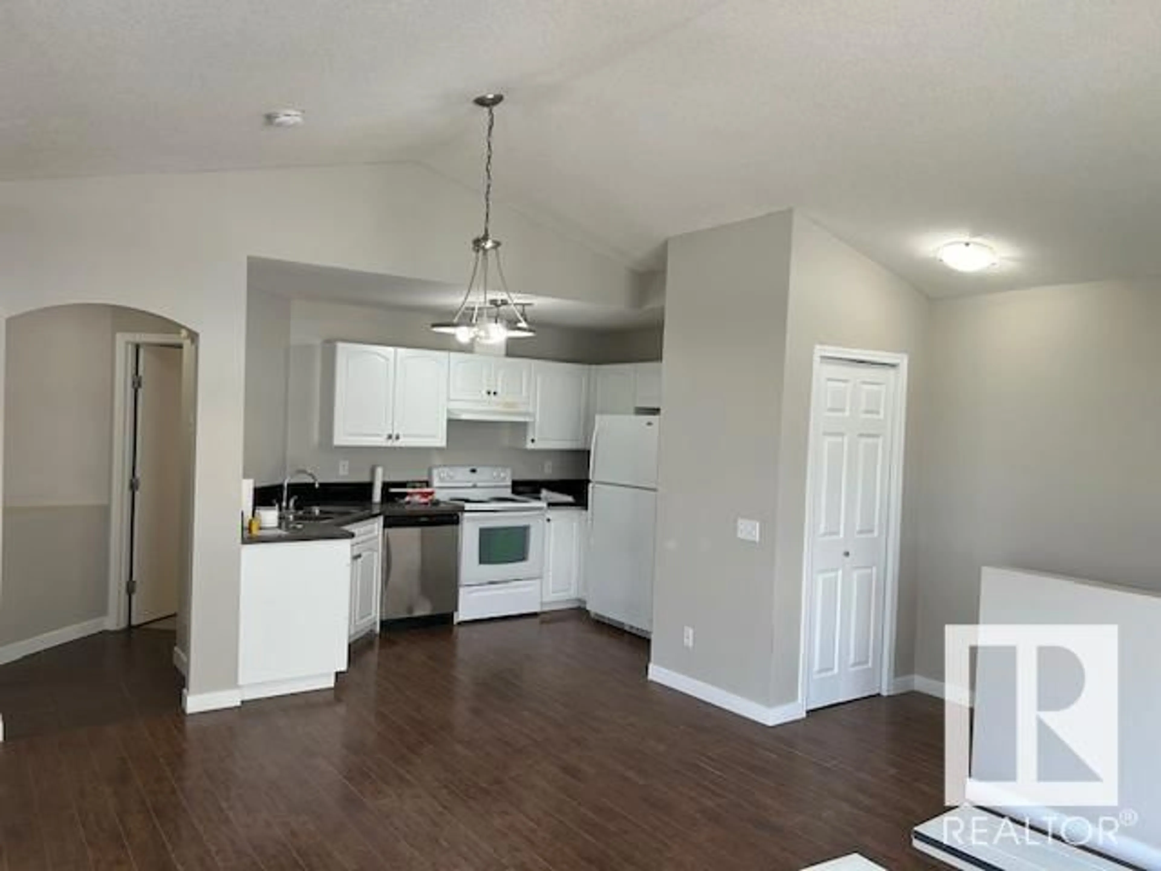 Open concept kitchen, wood/laminate floor for #11 - 150 EDWARDS DR, Edmonton Alberta T6X1M4