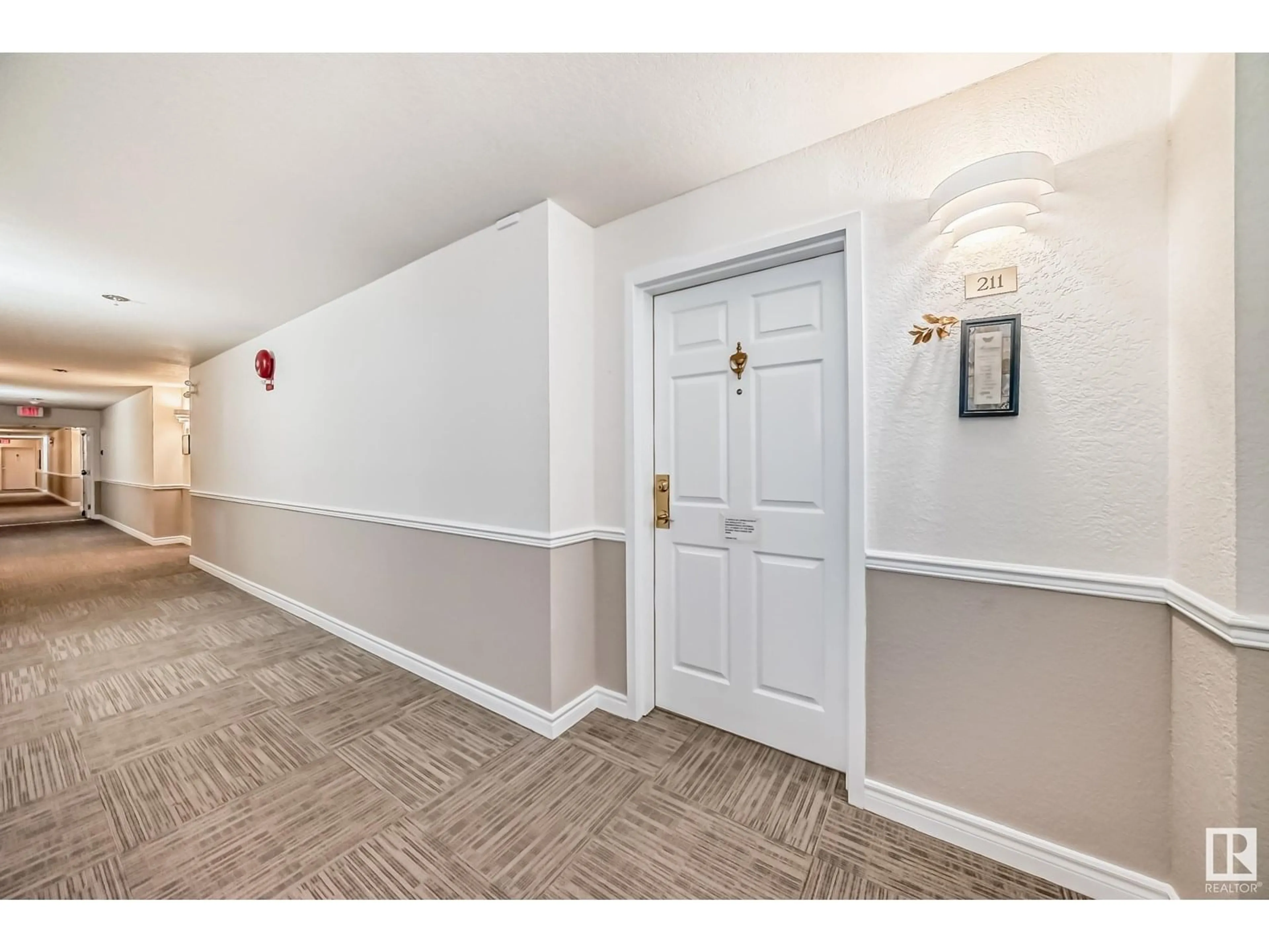 Indoor entryway for #211 - 10915 21 AV, Edmonton Alberta T6J6X2