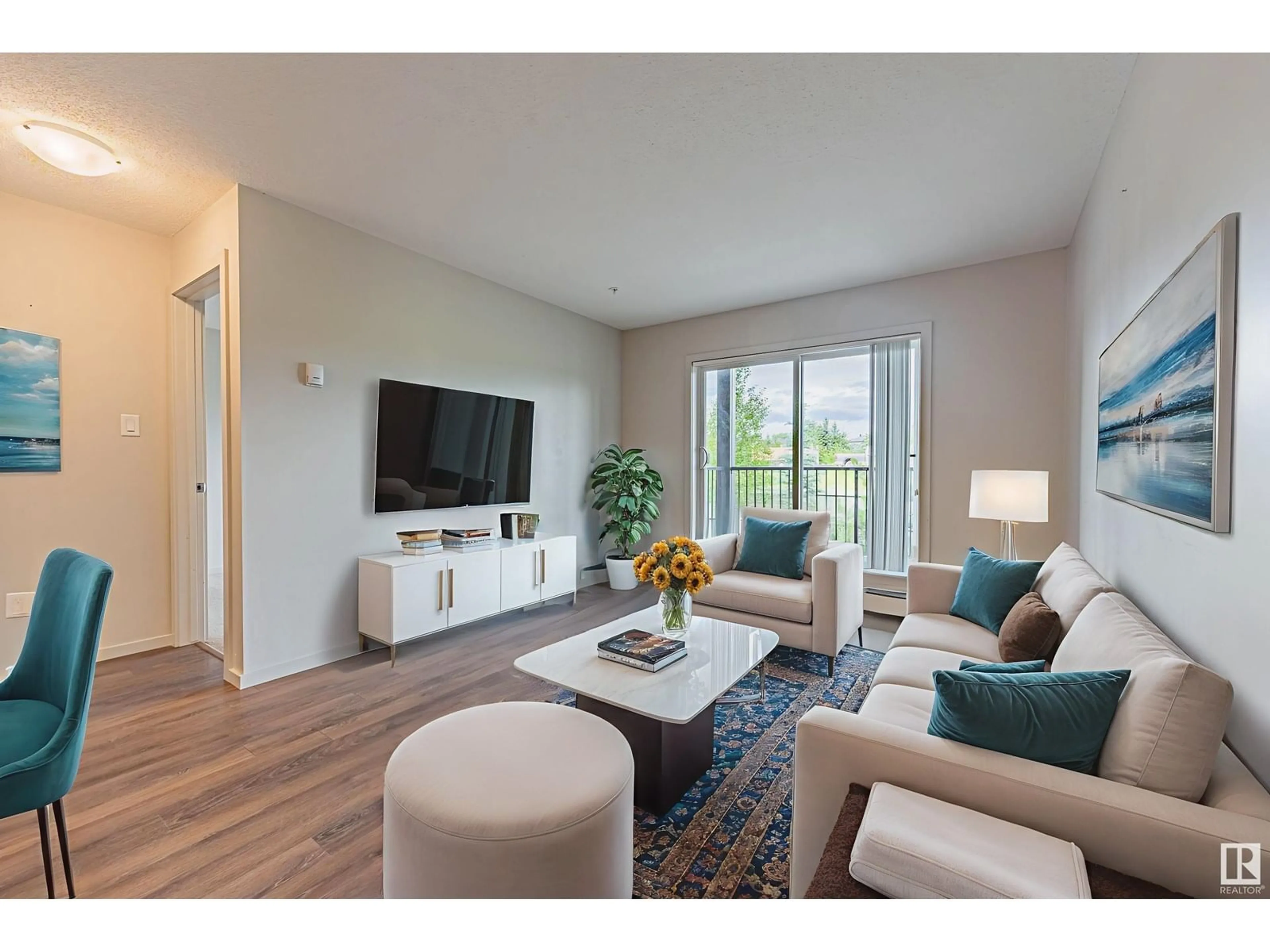 Living room with furniture, unknown for #209 - 142 EBBERS BV, Edmonton Alberta T5V3W2