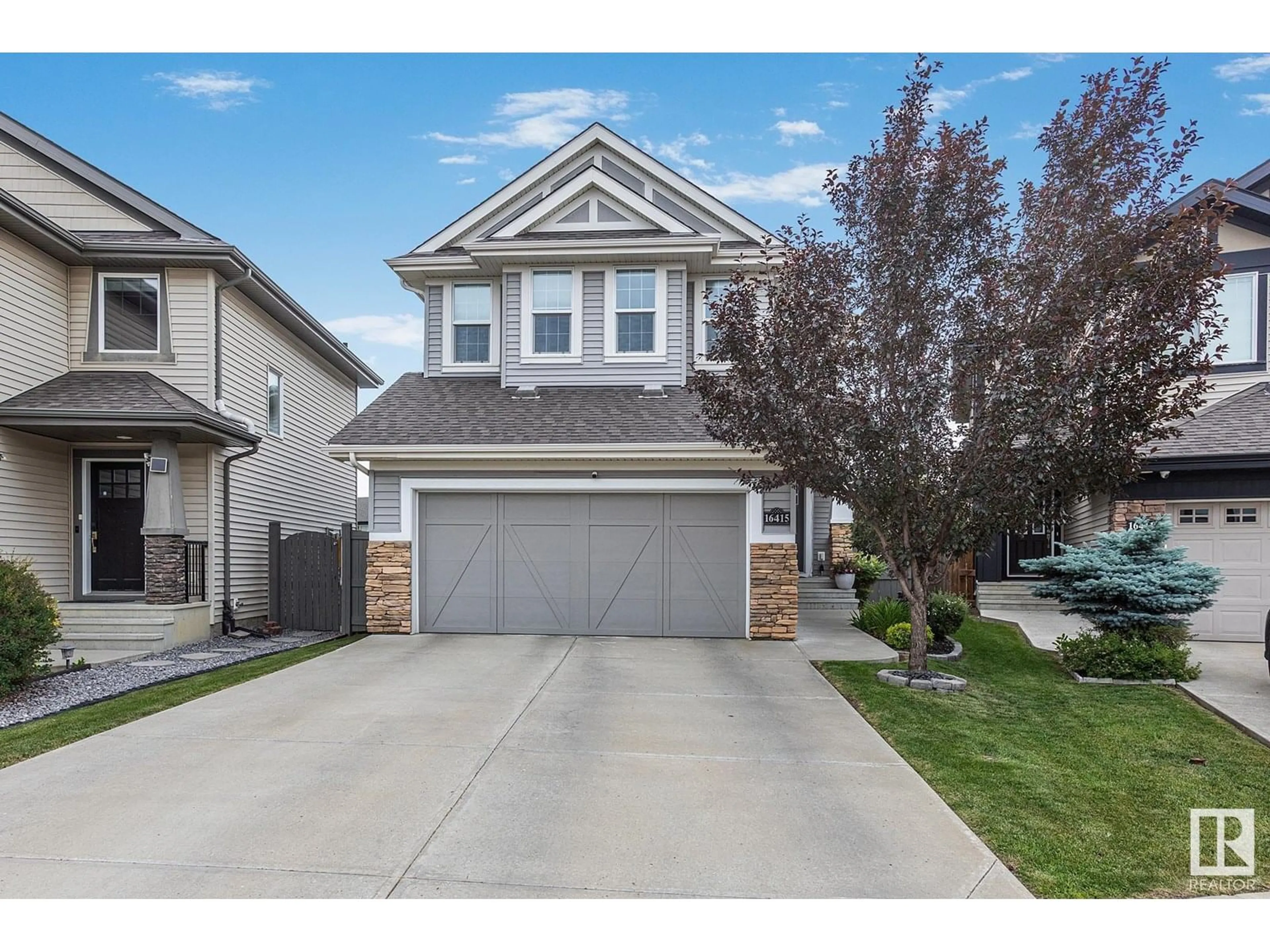 Home with vinyl exterior material, street for NW - 16415 138 ST, Edmonton Alberta T6V0G9
