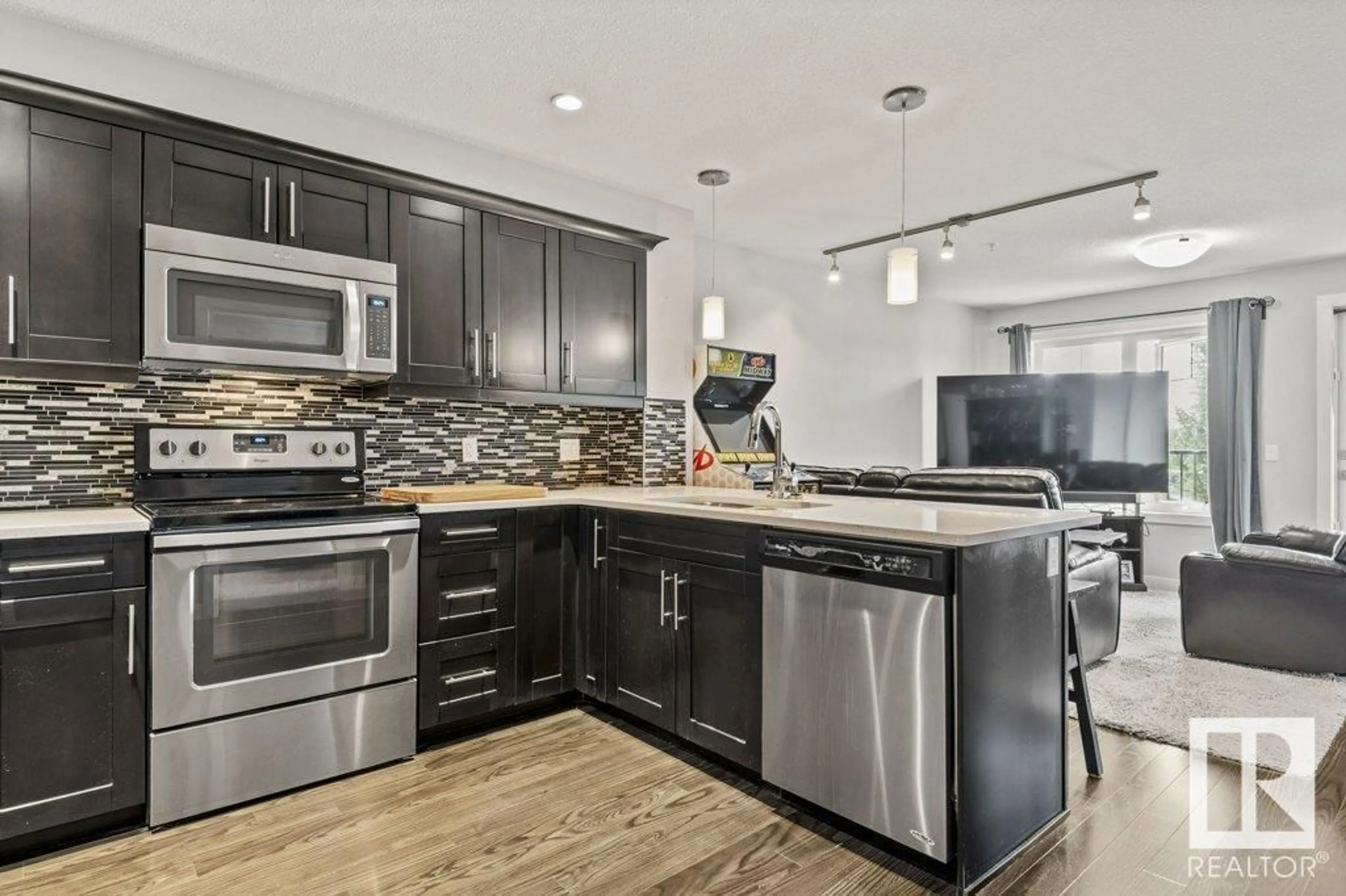 Open concept kitchen, ceramic/tile floor for #206 - 1031 173 ST, Edmonton Alberta T6W3E4