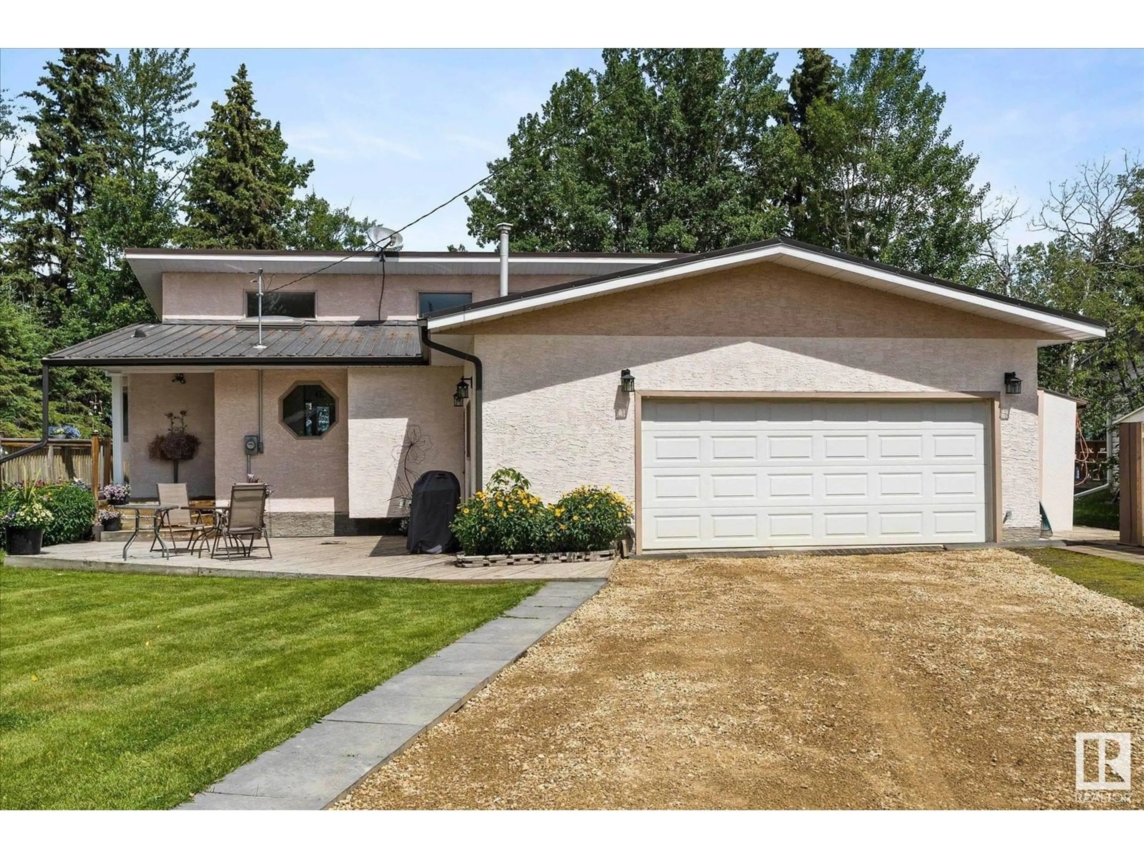 Home with vinyl exterior material, street for 16 53004 RGE ROAD 54A, Rural Parkland County Alberta T0E0B0