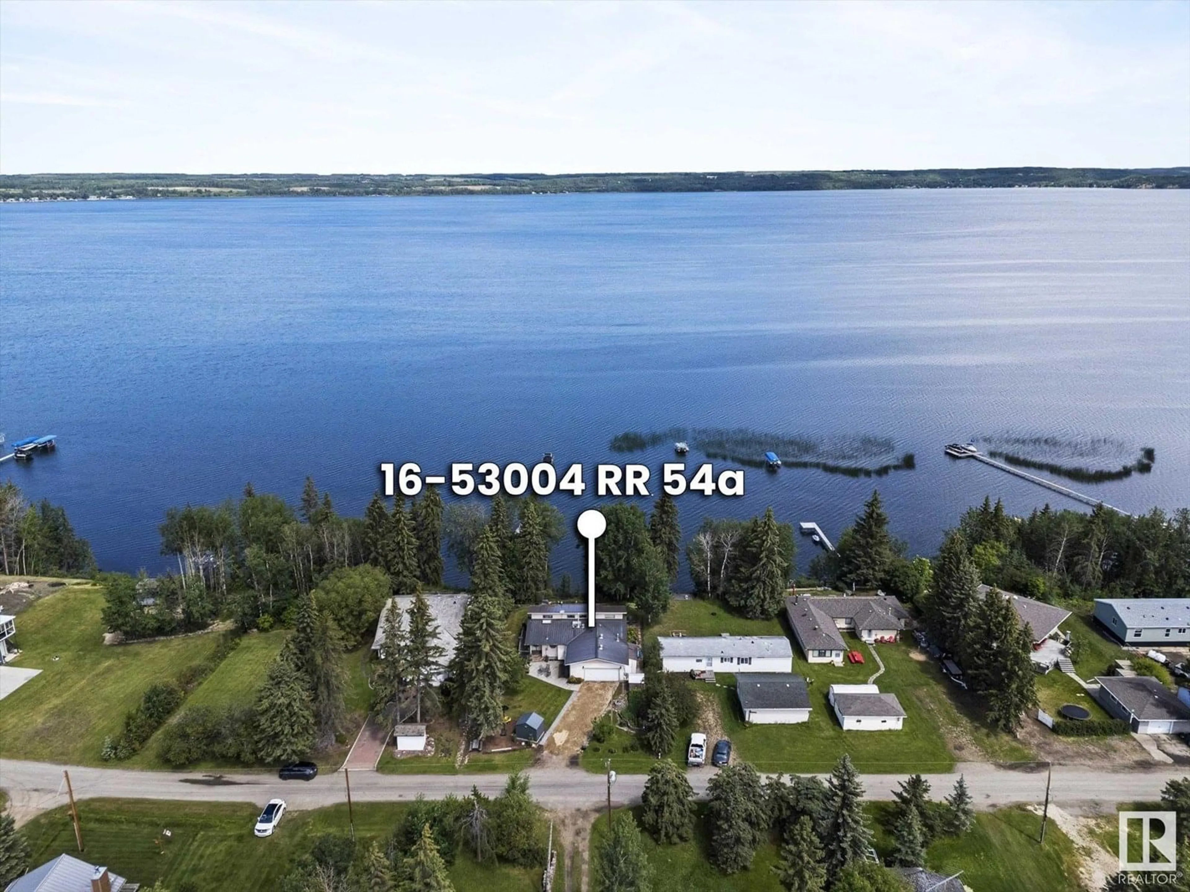 A pic from outside/outdoor area/front of a property/back of a property/a pic from drone, water/lake/river/ocean view for 16 53004 RGE ROAD 54A, Rural Parkland County Alberta T0E0B0