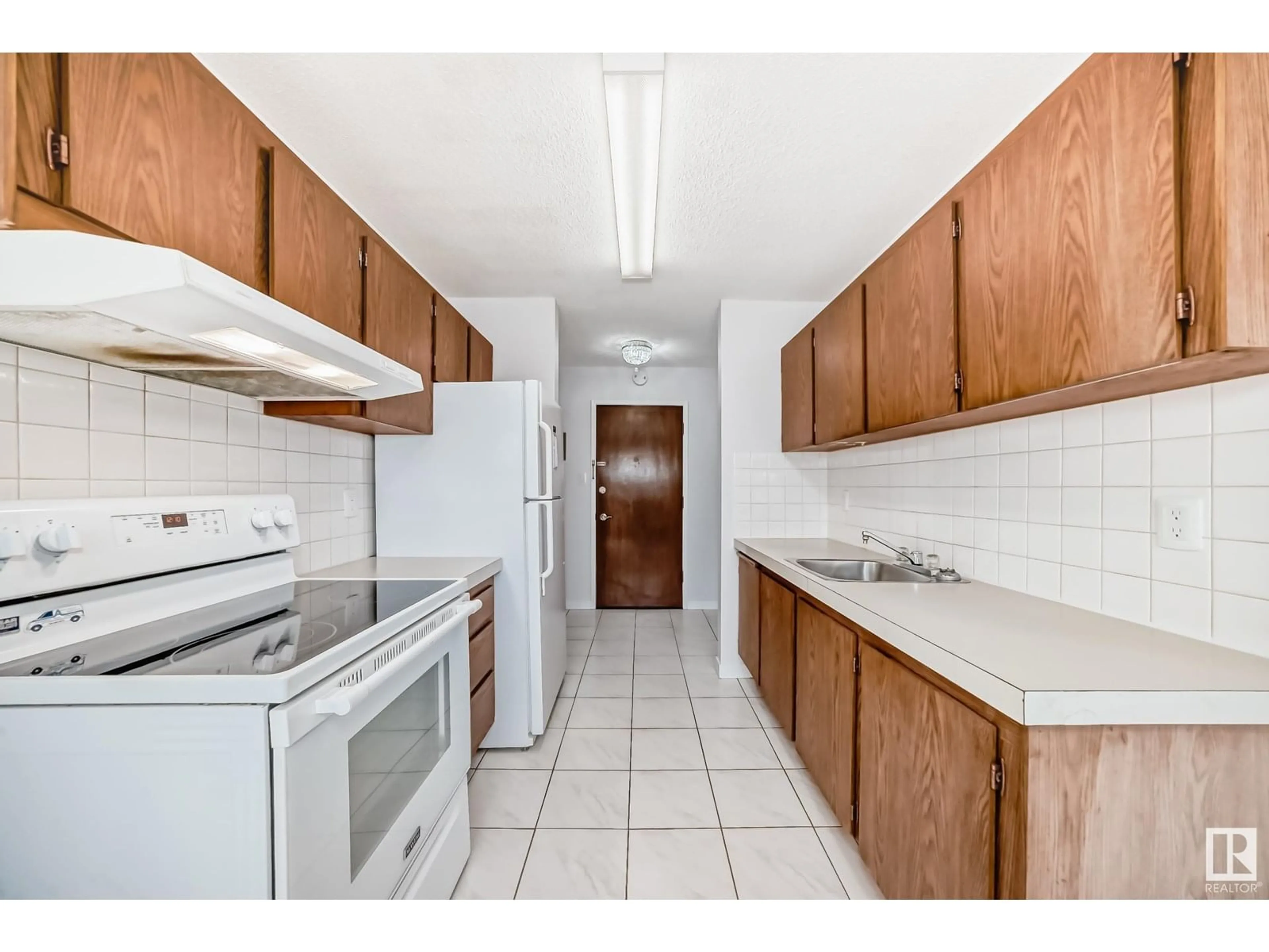 Standard kitchen, unknown for #202 - 10604 34 ST, Edmonton Alberta T5W1Y2