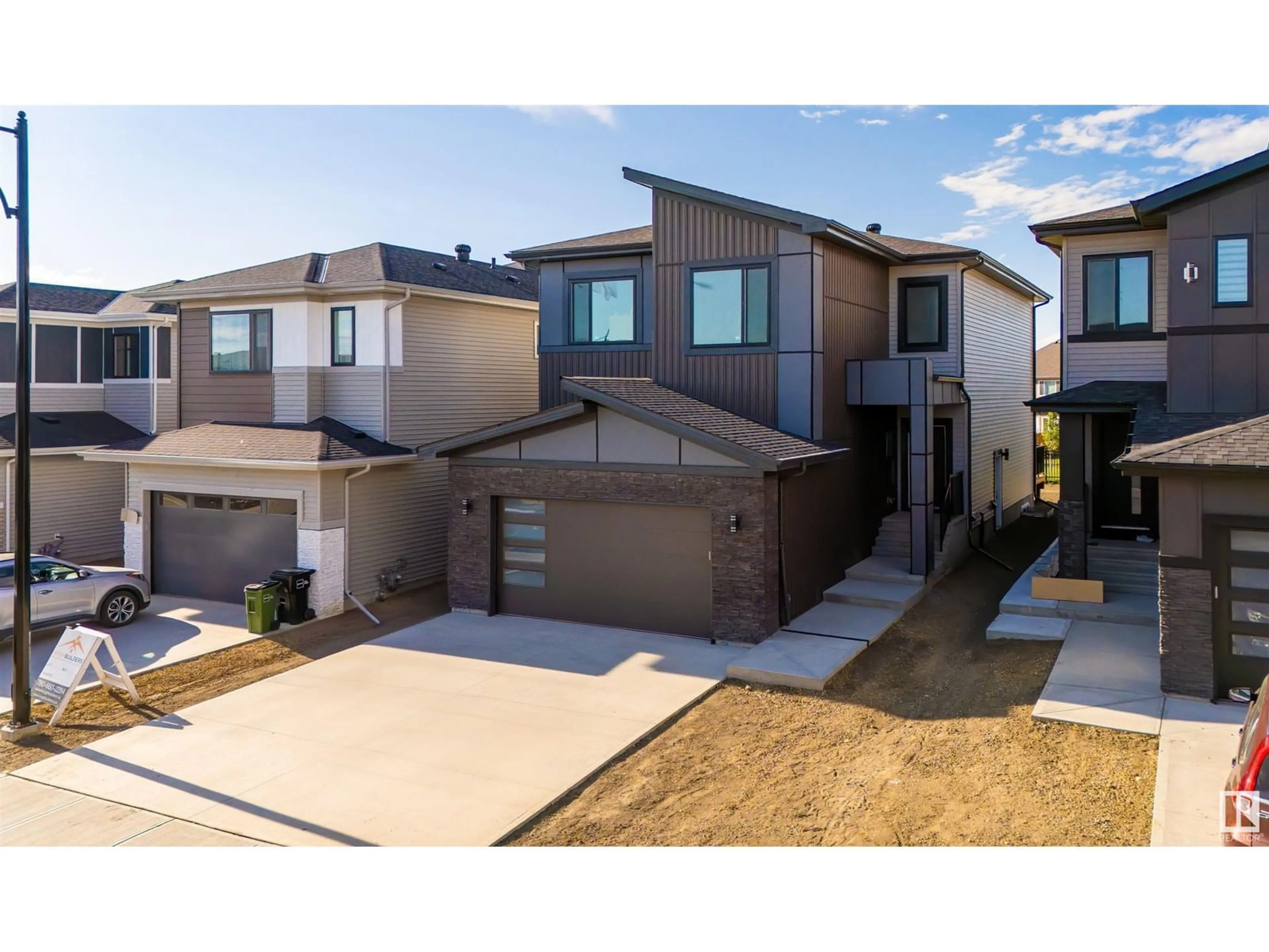 A pic from outside/outdoor area/front of a property/back of a property/a pic from drone, street for SW - 7047 KIVIAQ CR, Edmonton Alberta T6W5R2