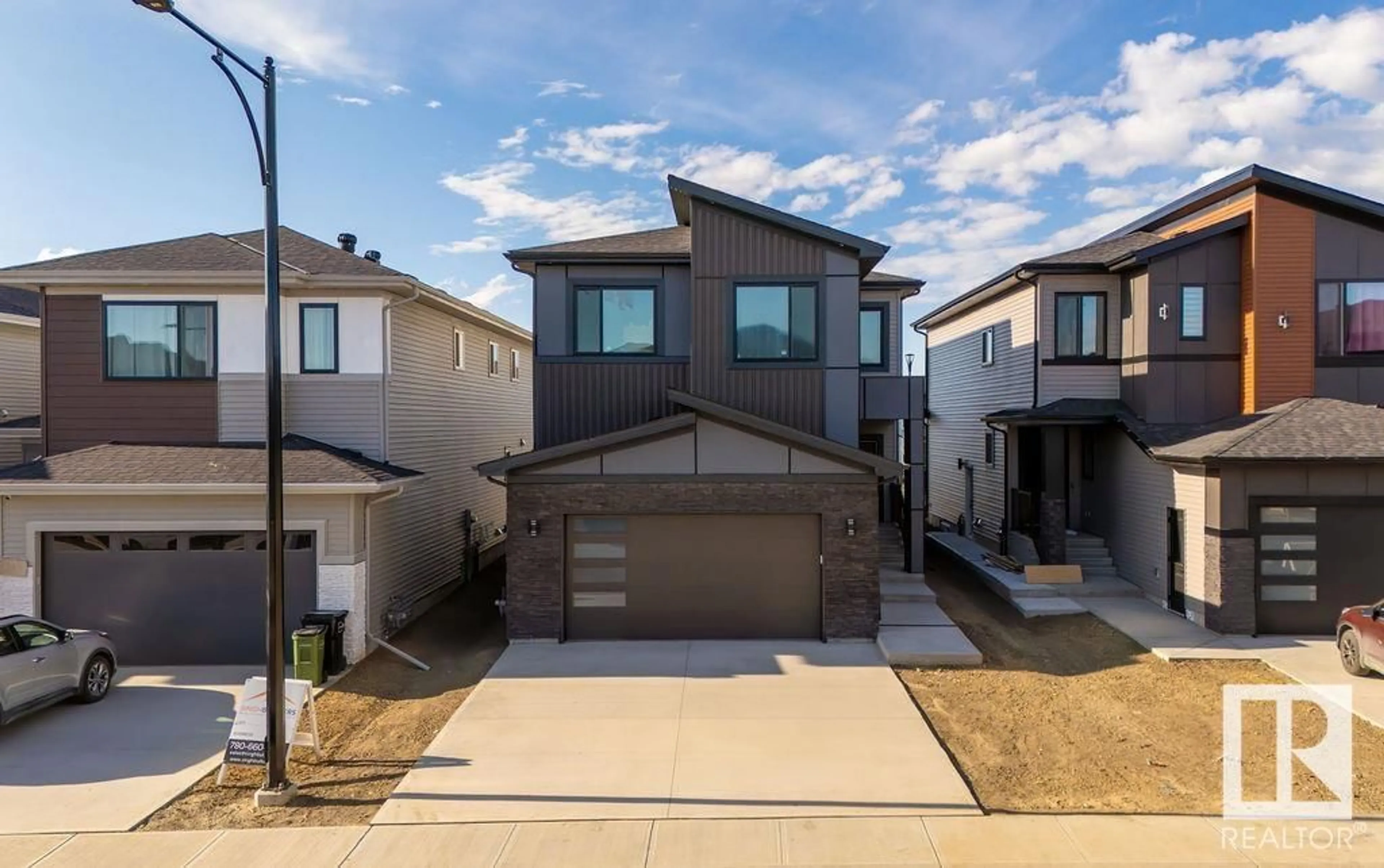 A pic from outside/outdoor area/front of a property/back of a property/a pic from drone, street for SW - 7047 KIVIAQ CR, Edmonton Alberta T6W5R2