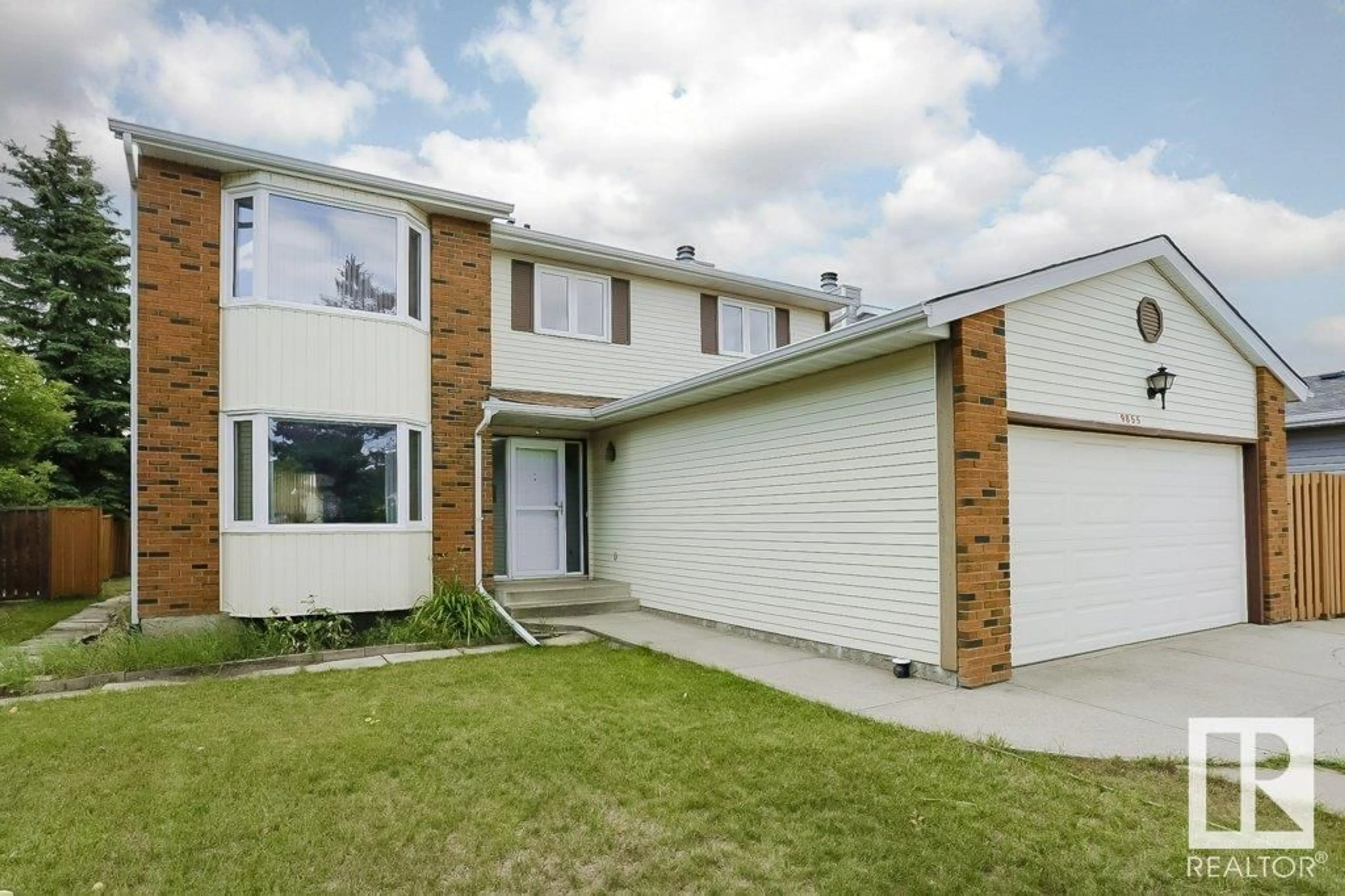 Home with vinyl exterior material, street for NW - 9855 179 ST, Edmonton Alberta T5T3P7