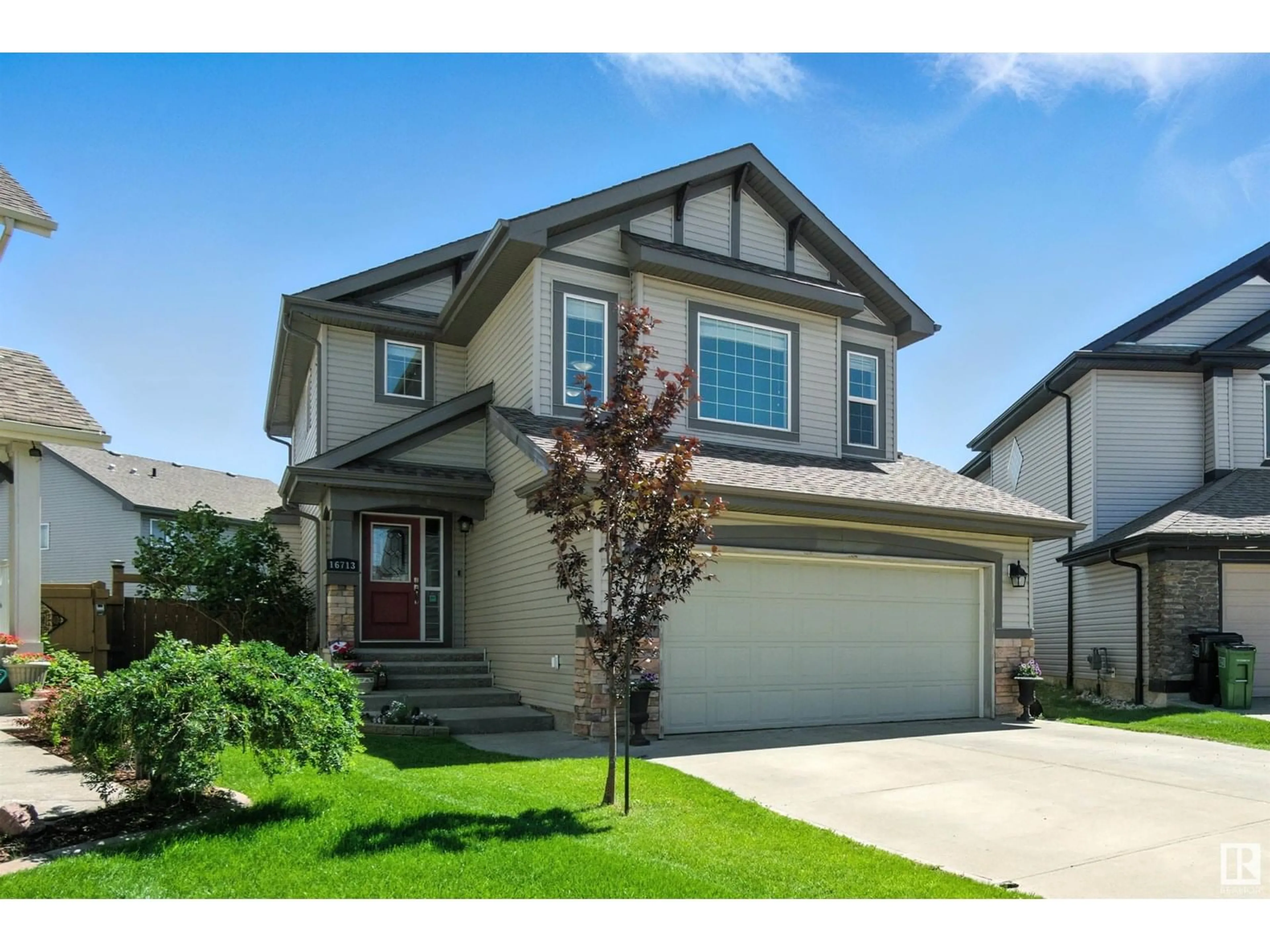 Home with vinyl exterior material, street for 16713 58A ST, Edmonton Alberta T5Y0K7