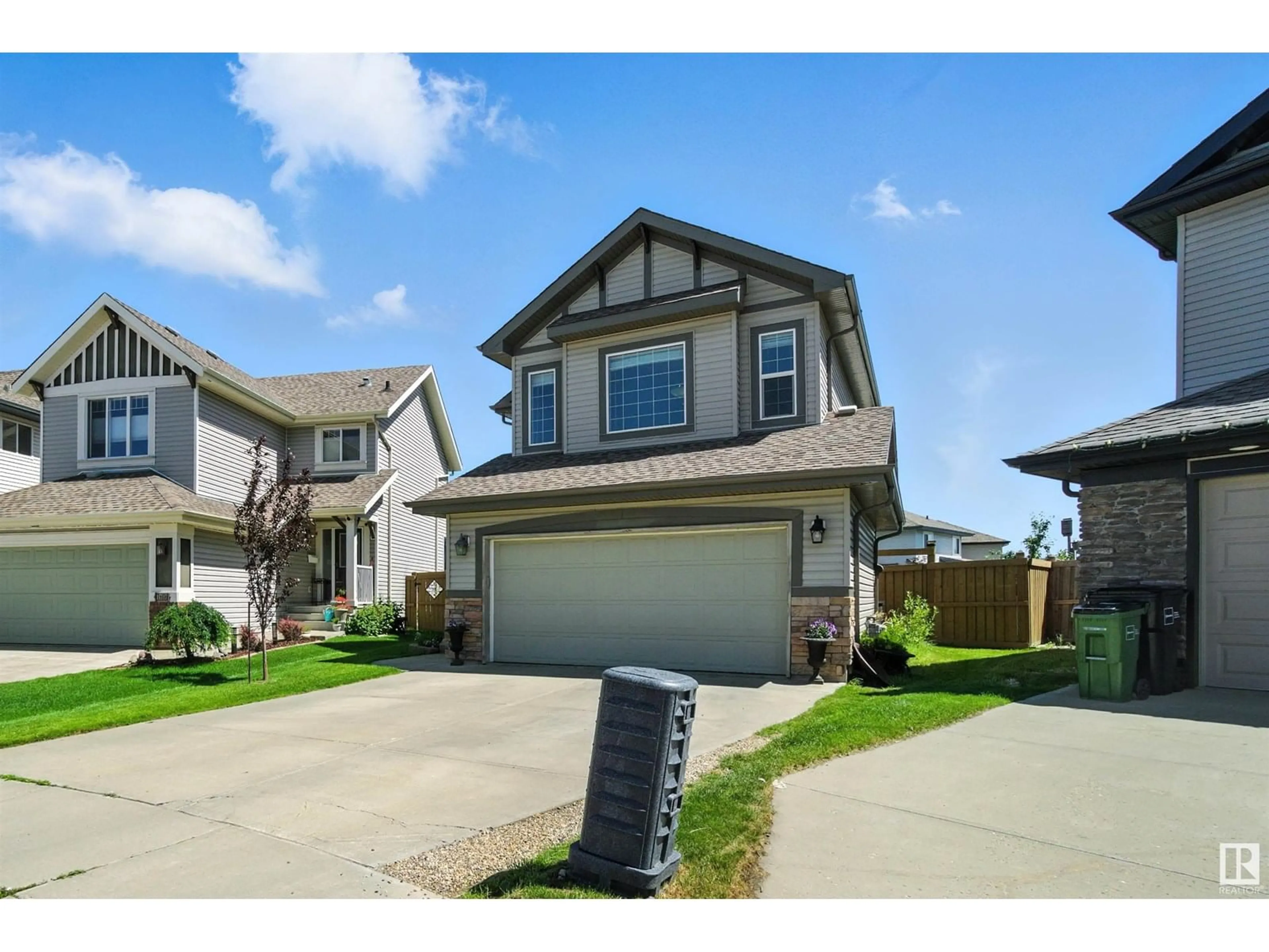 Home with vinyl exterior material, street for 16713 58A ST, Edmonton Alberta T5Y0K7
