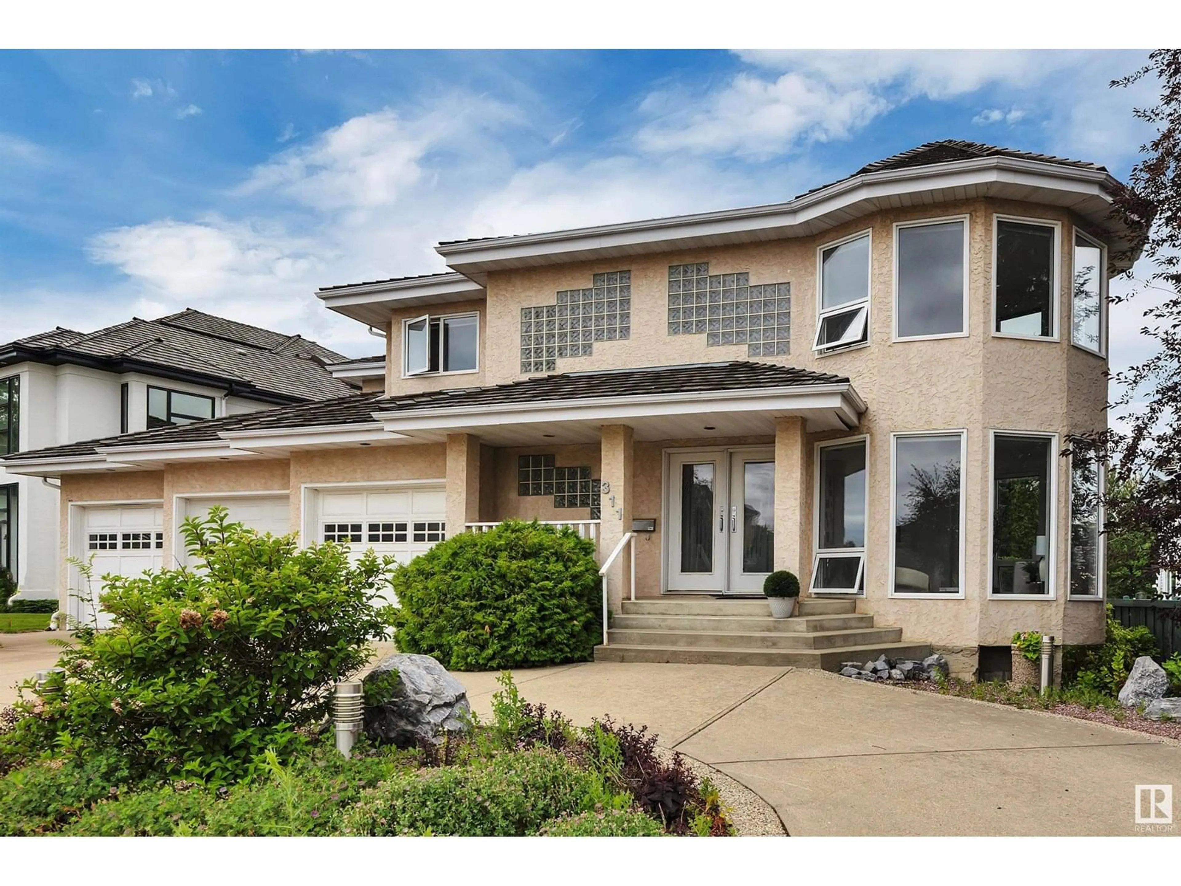 Home with vinyl exterior material, street for 311 FERRIS WY, Edmonton Alberta T6R2C8