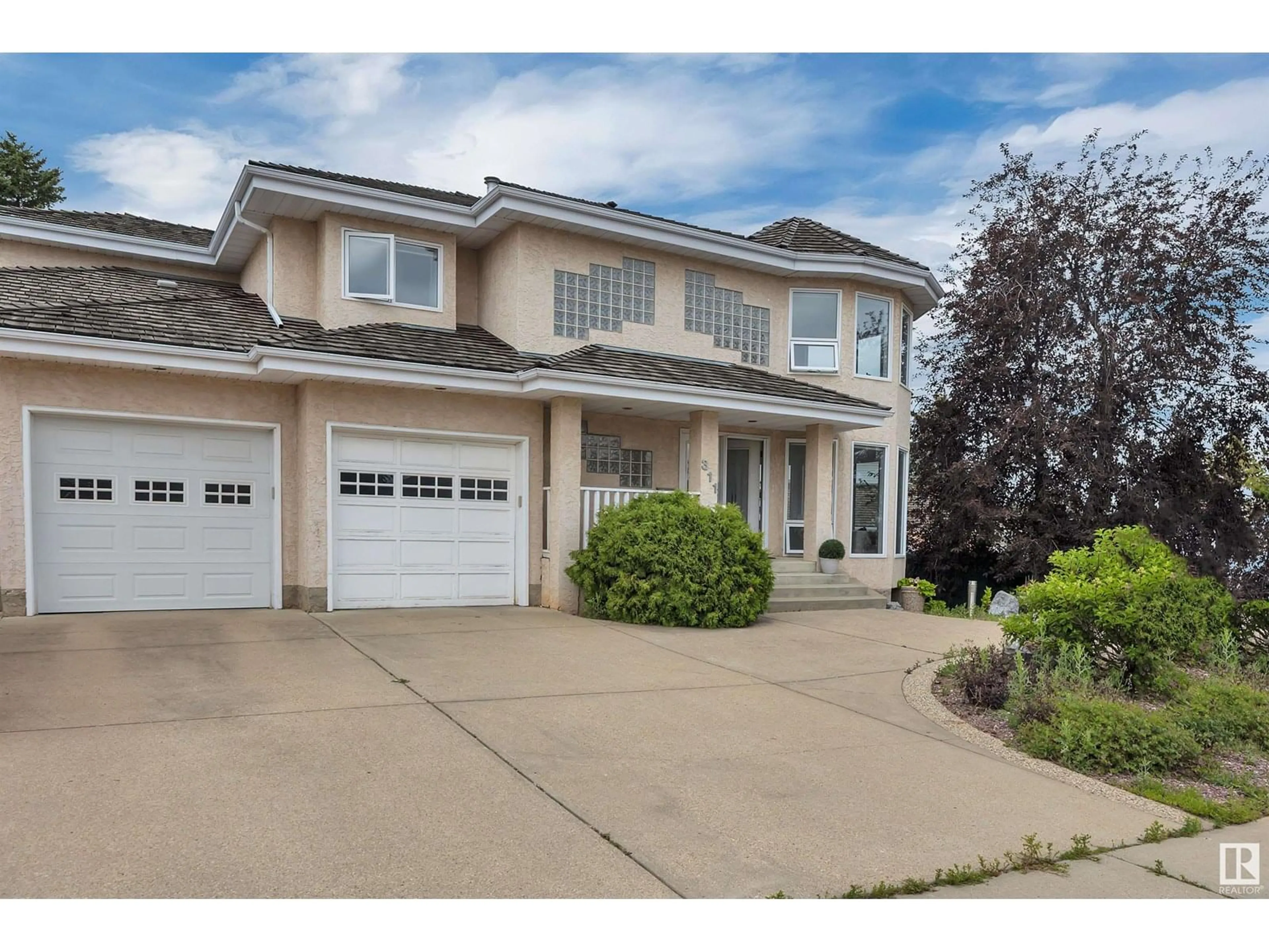 Home with vinyl exterior material, street for 311 FERRIS WY, Edmonton Alberta T6R2C8