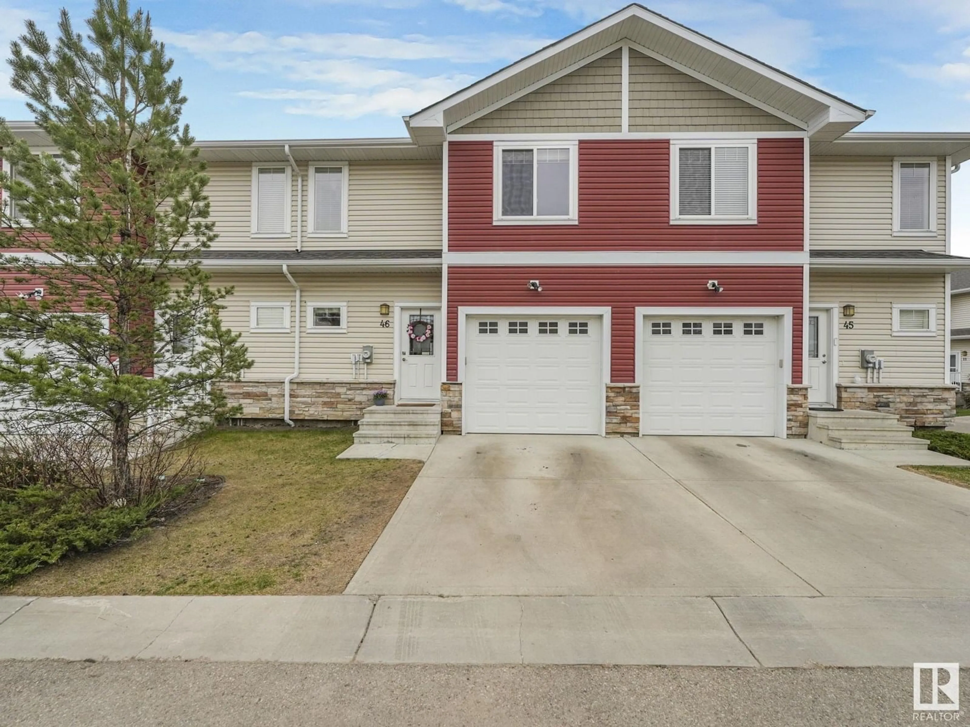 Home with vinyl exterior material, street for 450 - 46 MCCONACHIE WY, Edmonton Alberta T5Y0S8