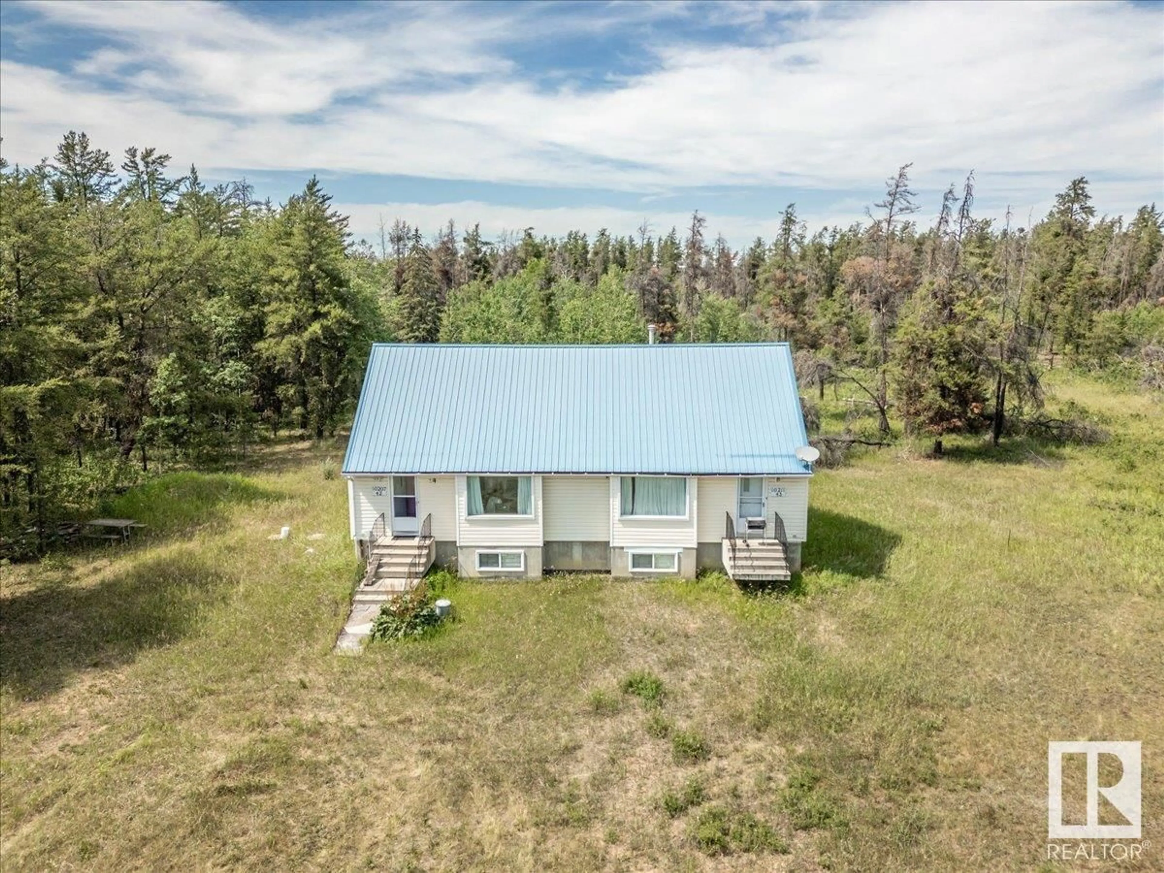 A pic from outside/outdoor area/front of a property/back of a property/a pic from drone, unknown for 57021 RGE ROAD 213, Rural Sturgeon County Alberta T0A2W0