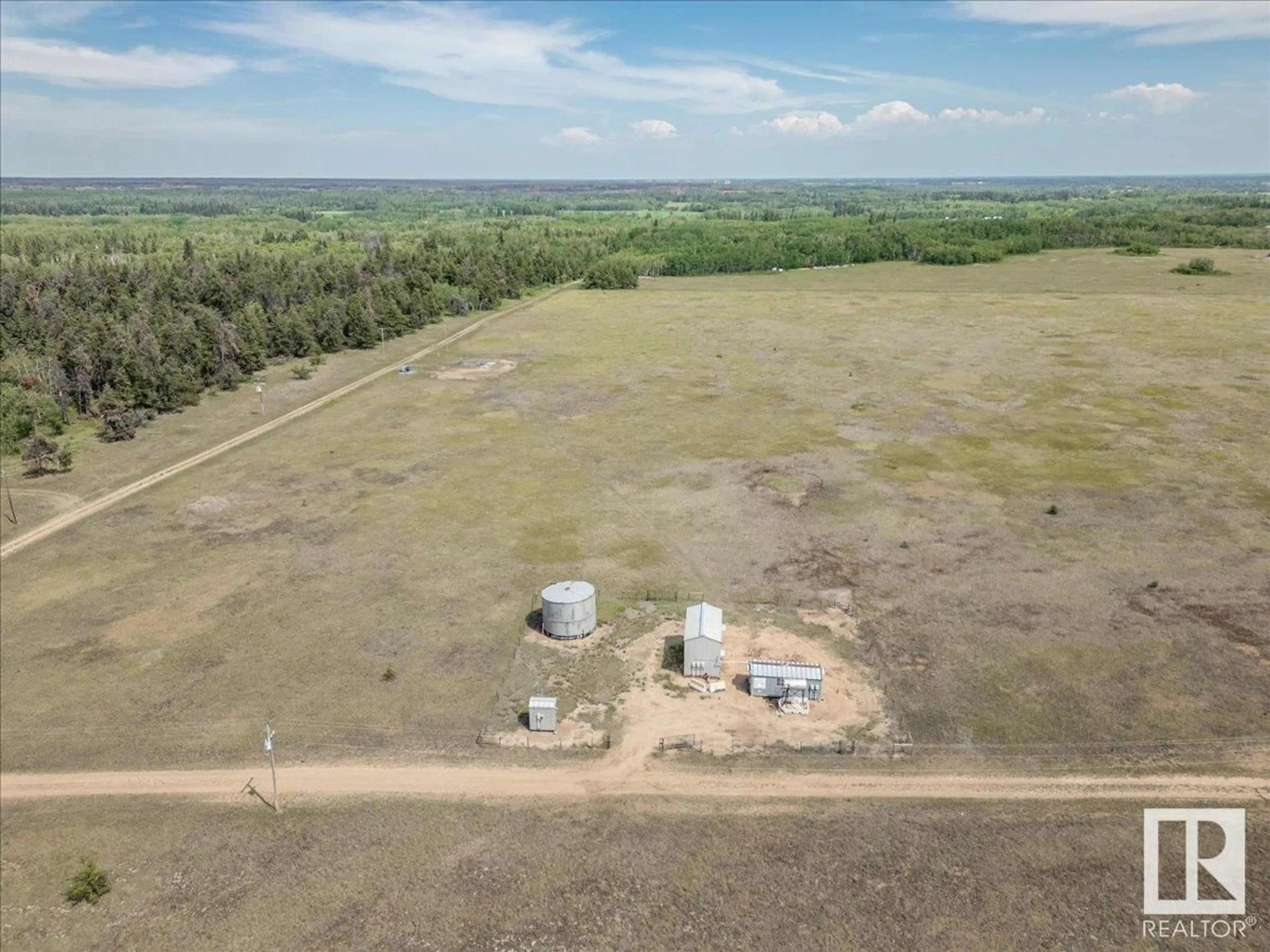 A pic from outside/outdoor area/front of a property/back of a property/a pic from drone, building for 57021 RGE ROAD 213, Rural Sturgeon County Alberta T0A2W0