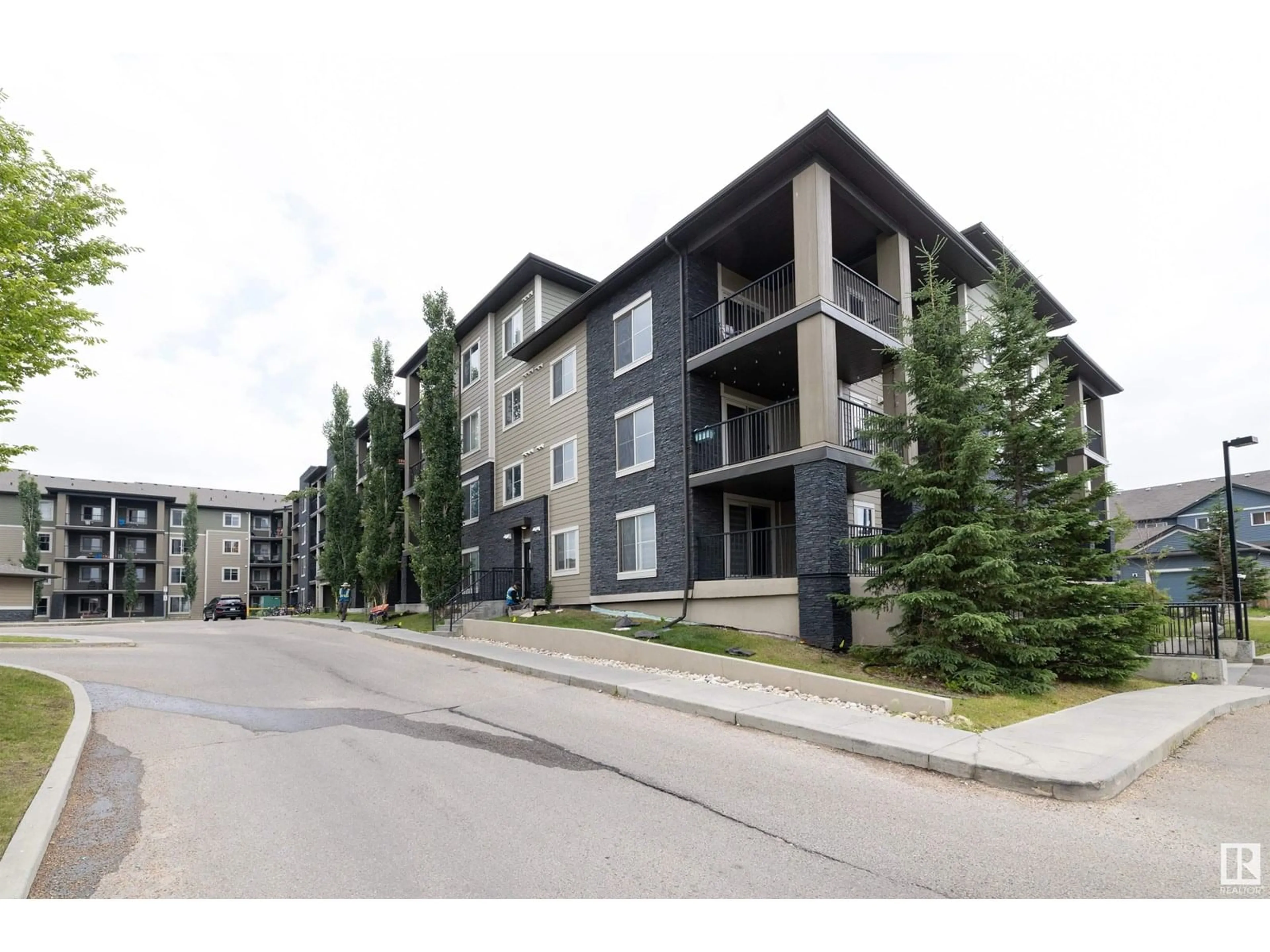 A pic from outside/outdoor area/front of a property/back of a property/a pic from drone, unknown for 111 - 206 WATT CM, Edmonton Alberta T6X2C6