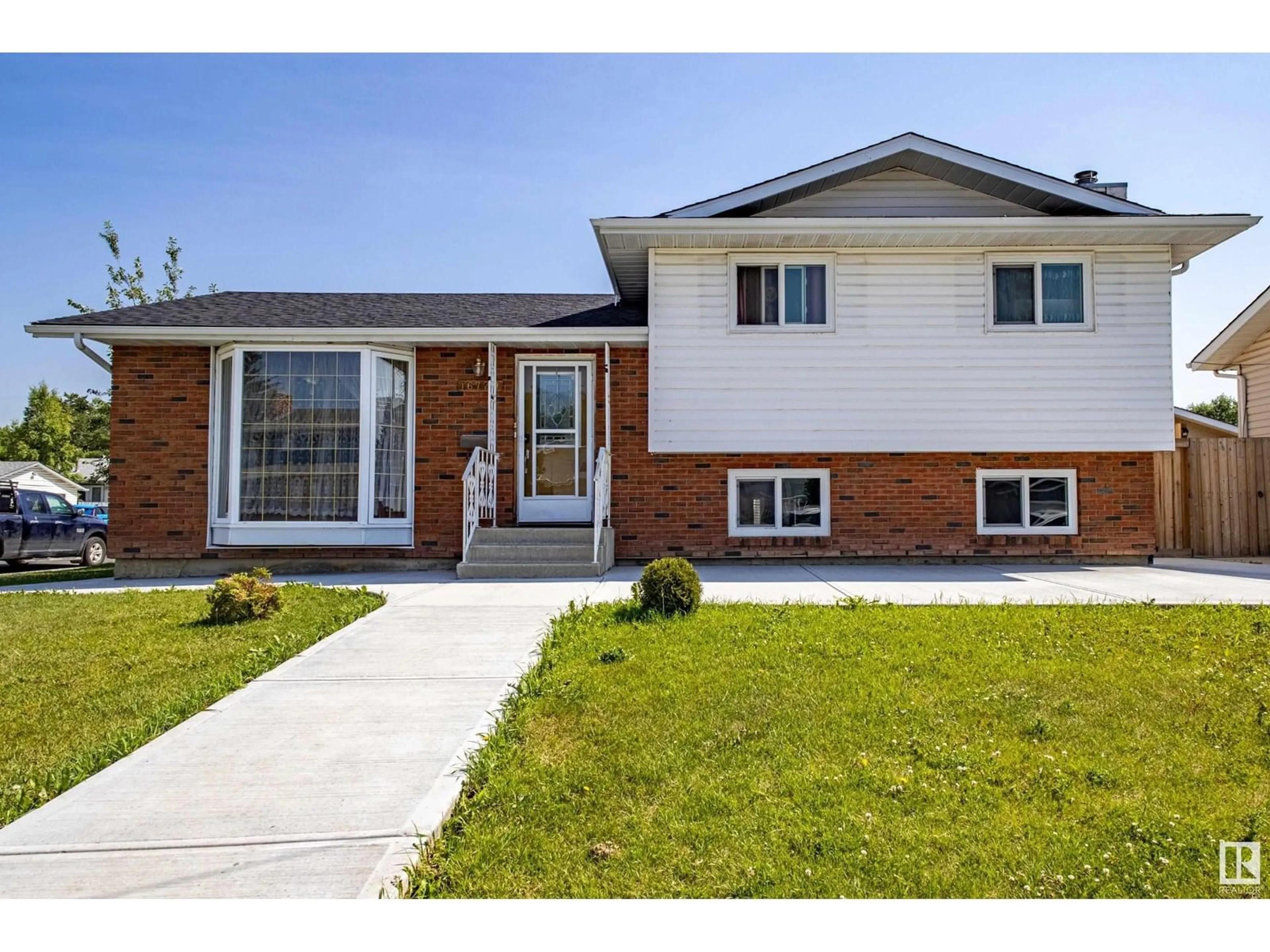Home with brick exterior material, street for NW - 16729 109A ST, Edmonton Alberta T5X2T7