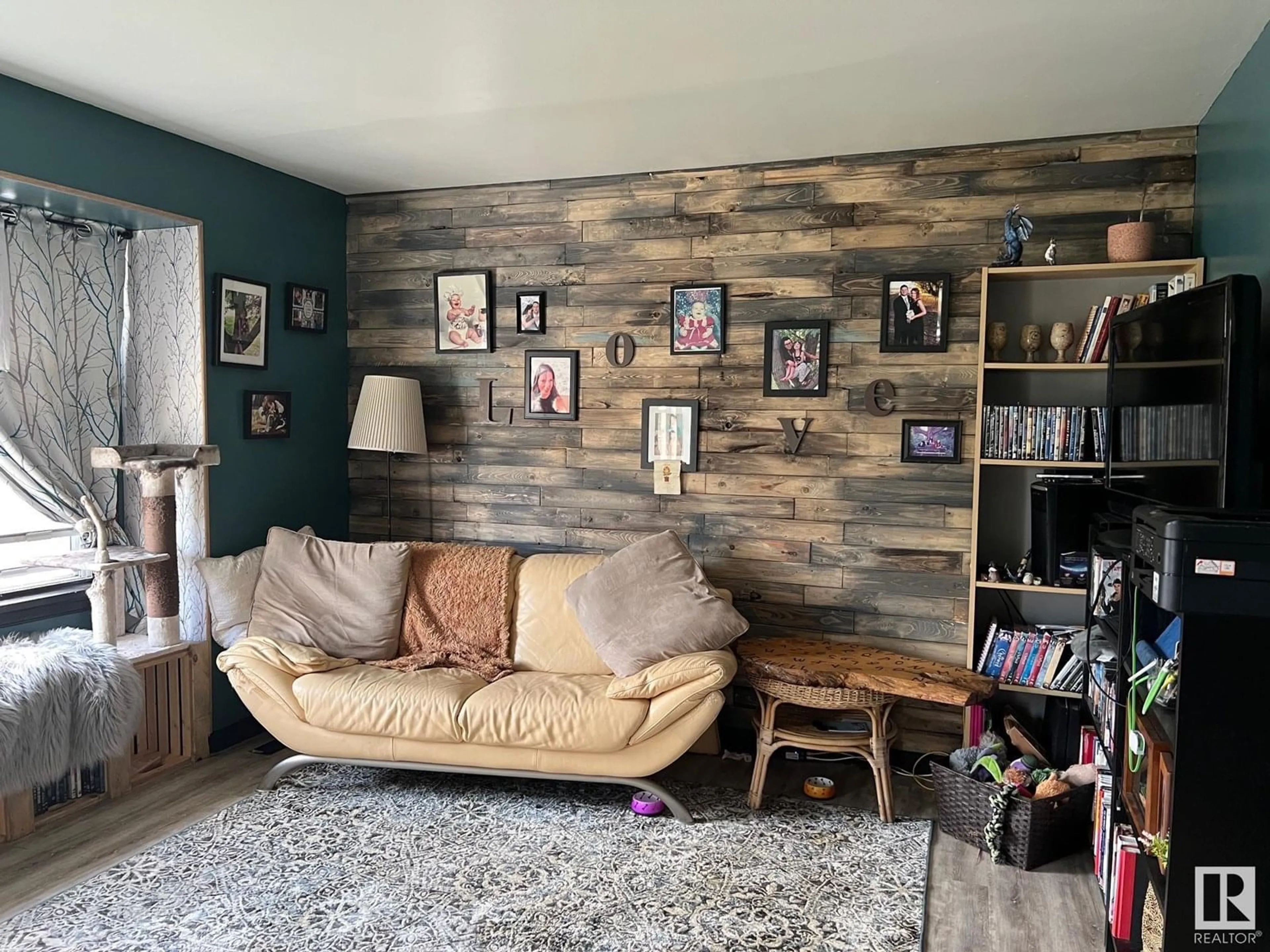 Living room with furniture, wood/laminate floor for 4832 50 AV, Chipman Alberta T0B0W0