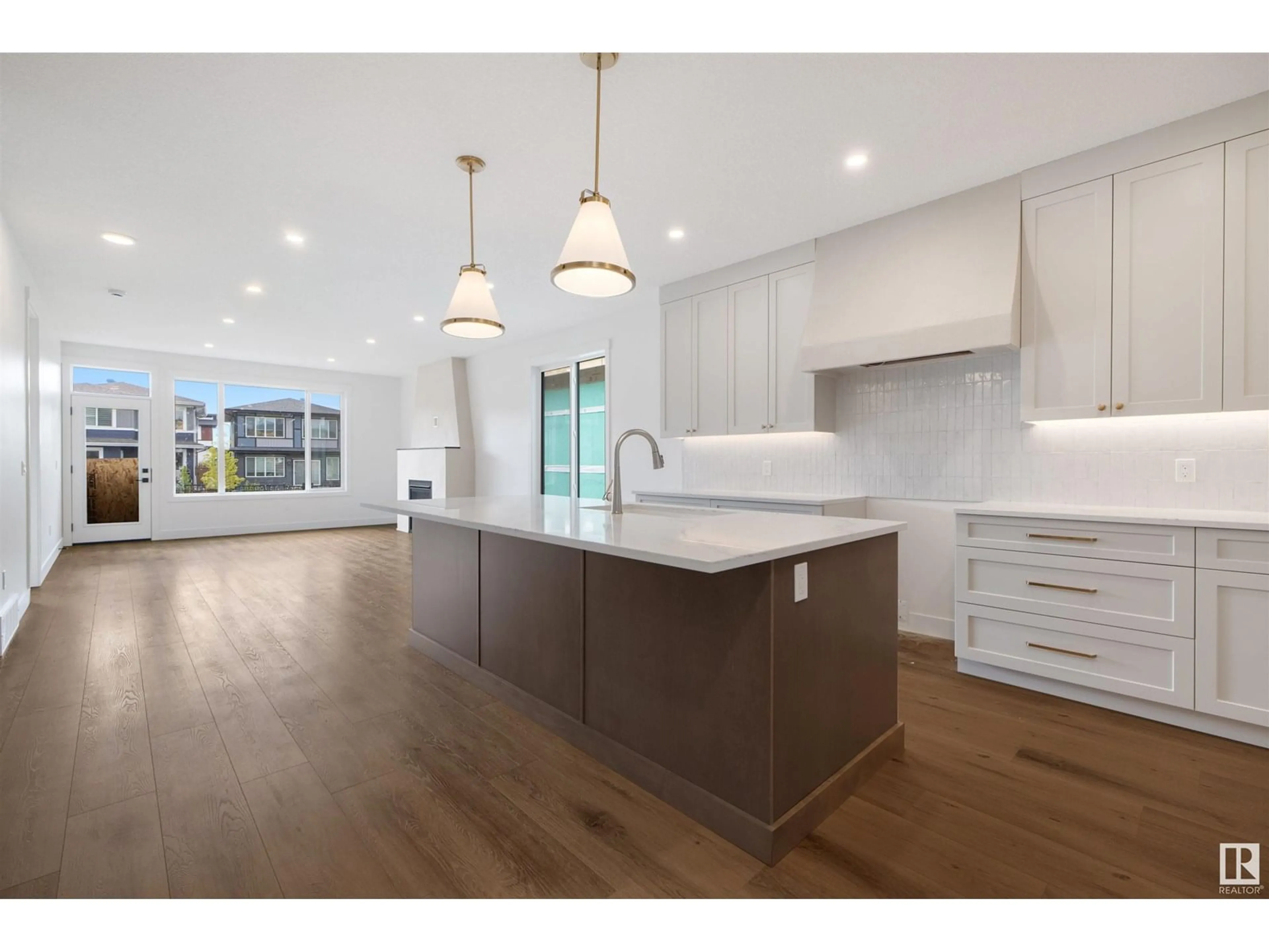 Open concept kitchen, wood/laminate floor for 7 SYDWYCK CI, Spruce Grove Alberta T7X0A0