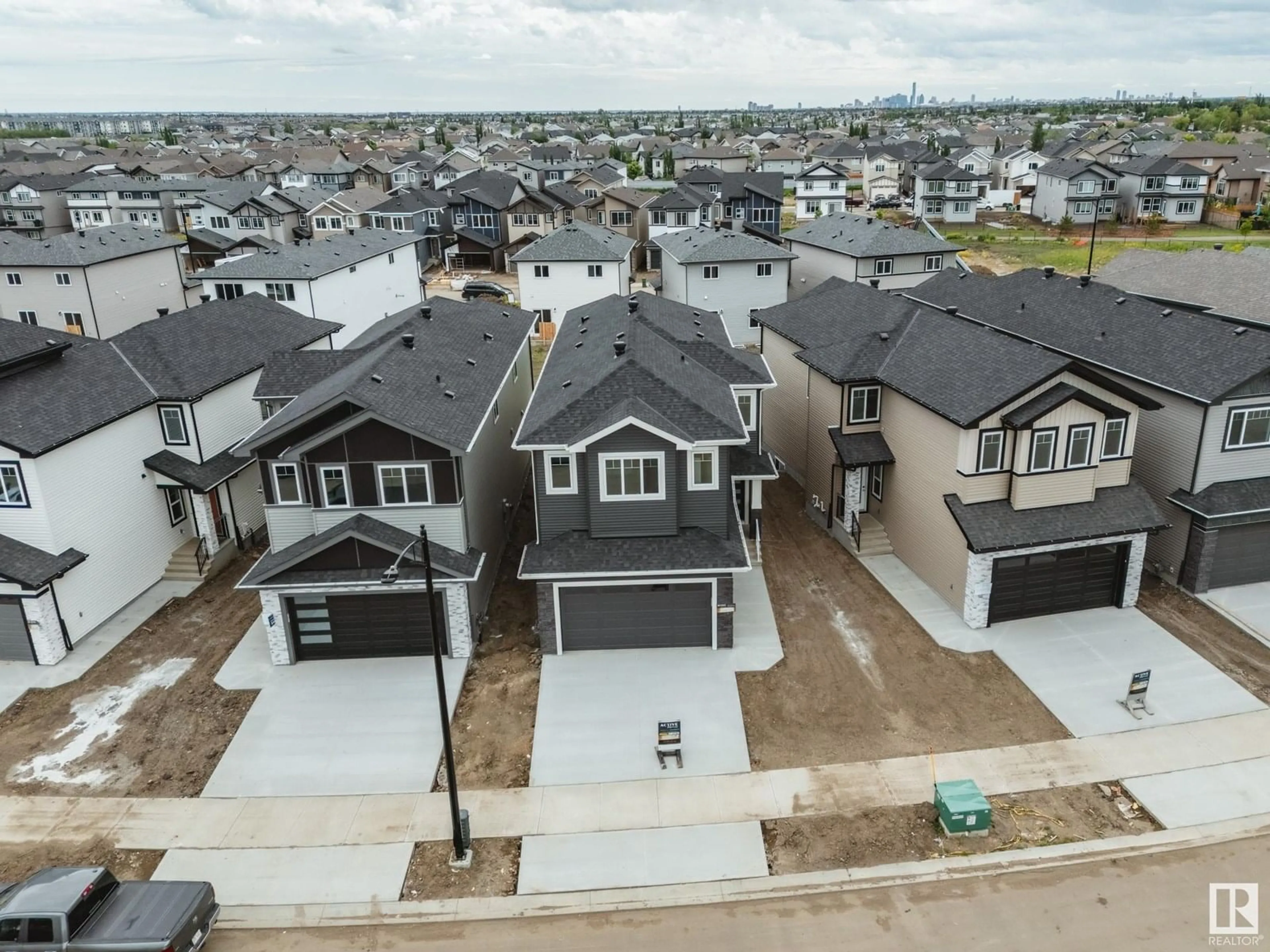 A pic from outside/outdoor area/front of a property/back of a property/a pic from drone, street for 8803 183 AV, Edmonton Alberta T5Z2K6