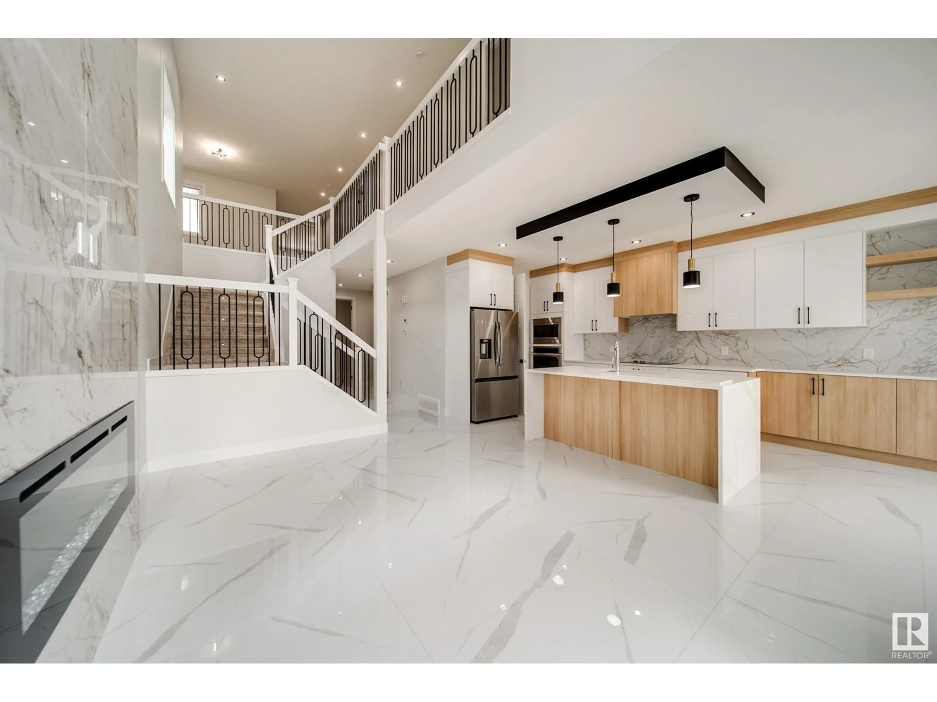 Open concept kitchen, ceramic/tile floor for 8803 183 AV, Edmonton Alberta T5Z2K6