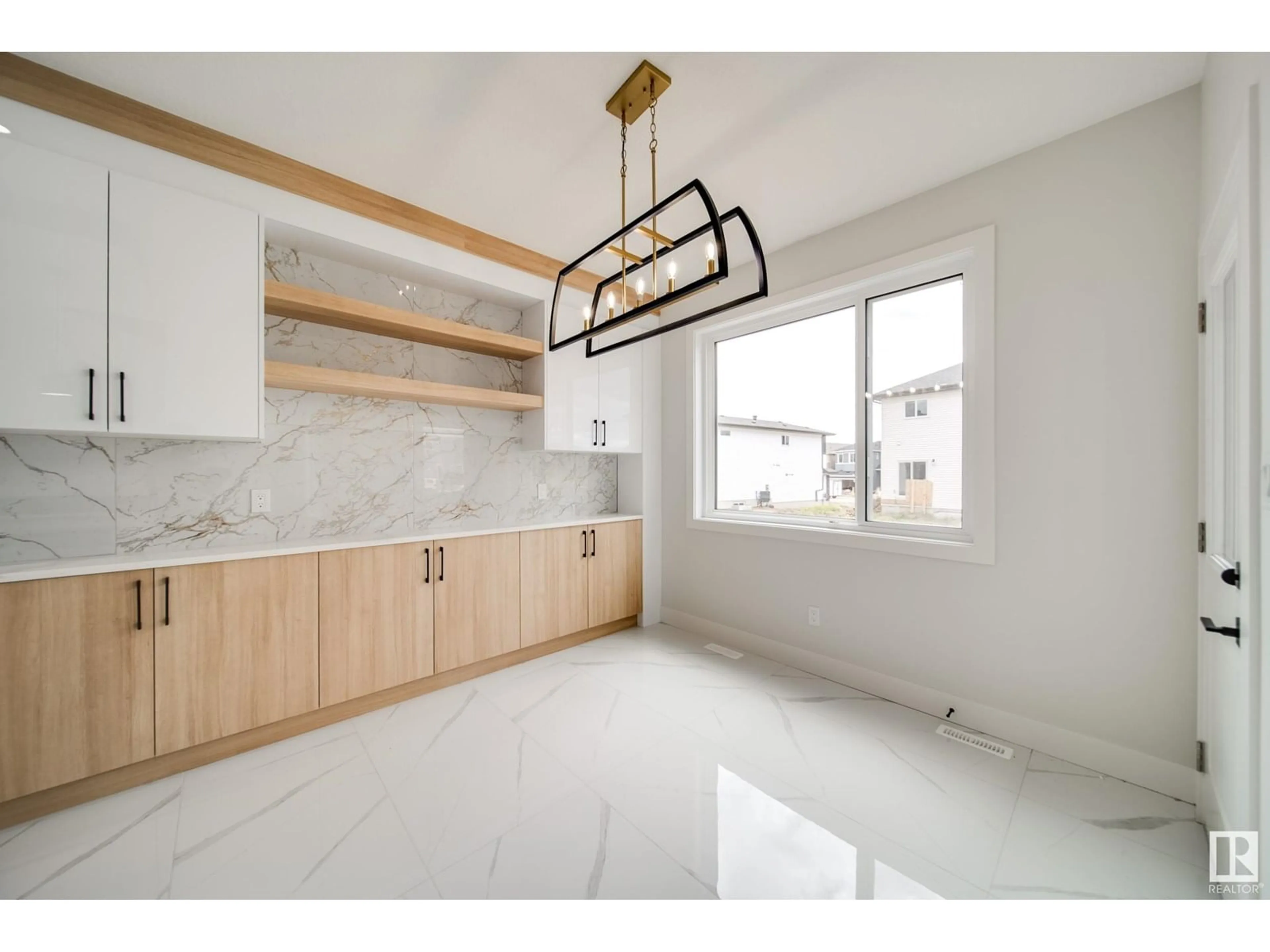 Open concept kitchen, ceramic/tile floor for 8803 183 AV, Edmonton Alberta T5Z2K6