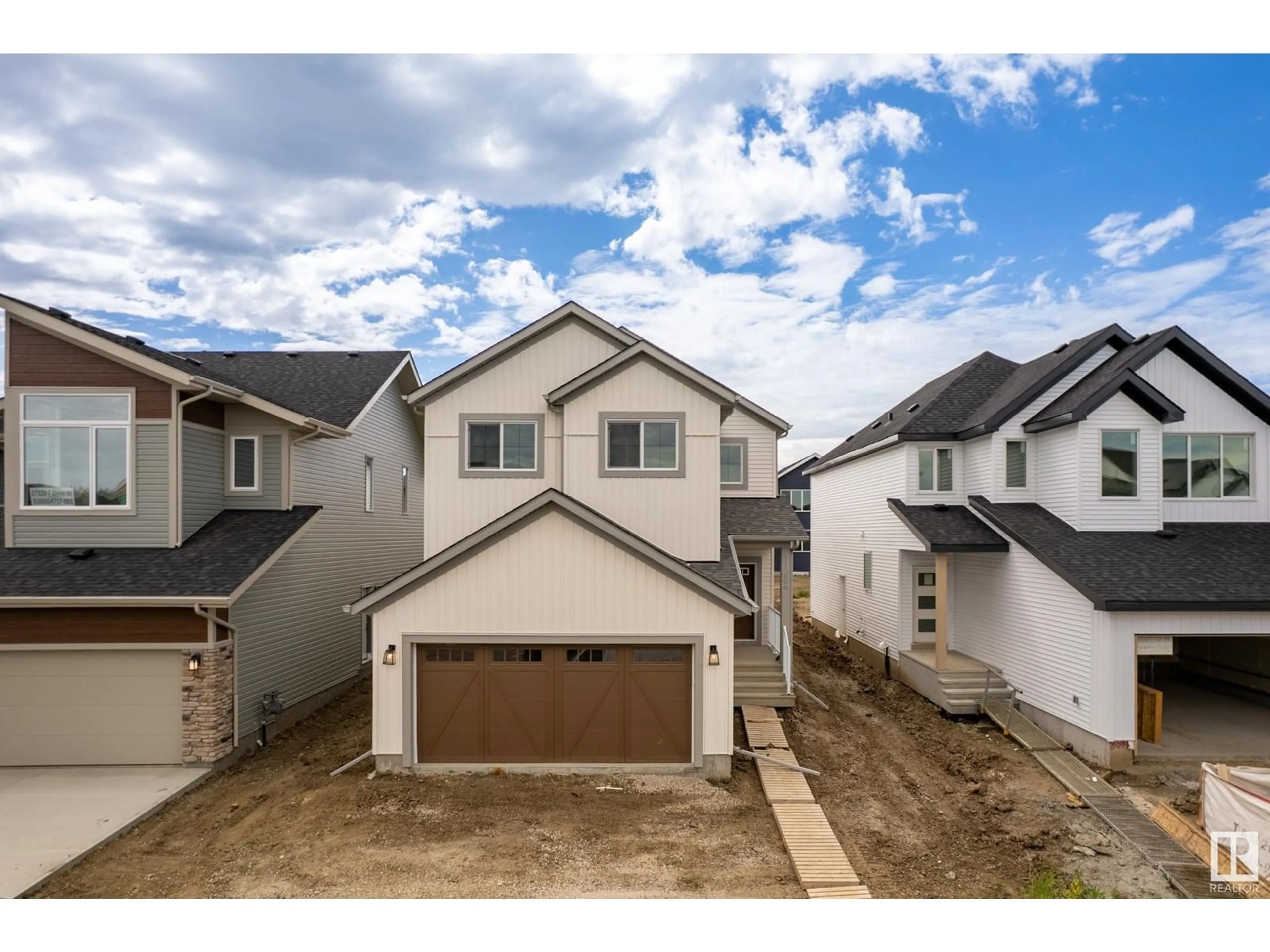 A pic from outside/outdoor area/front of a property/back of a property/a pic from drone, street for NE - 17324 7 ST, Edmonton Alberta T5Y4E8