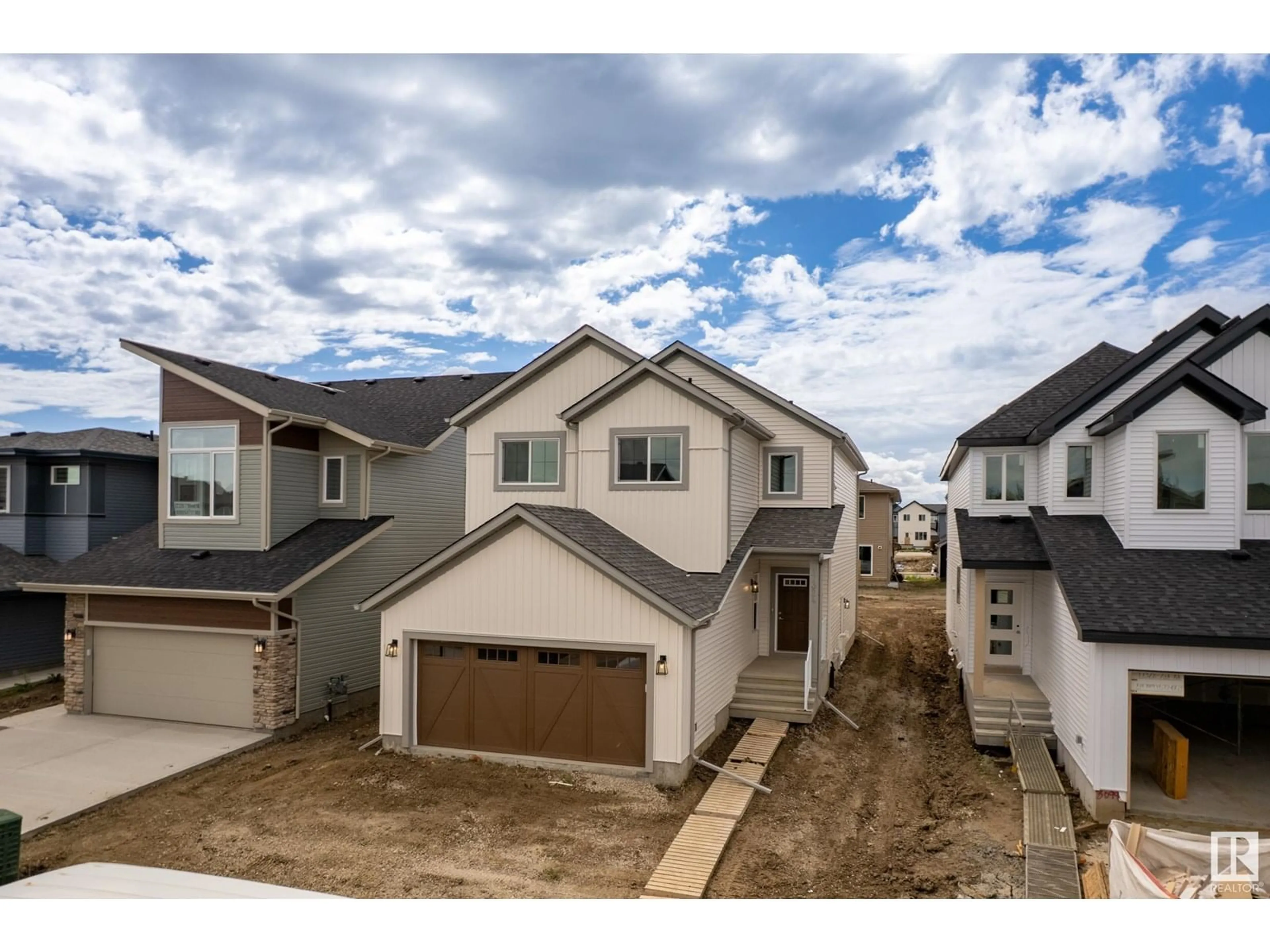 A pic from outside/outdoor area/front of a property/back of a property/a pic from drone, street for NE - 17324 7 ST, Edmonton Alberta T5Y4E8
