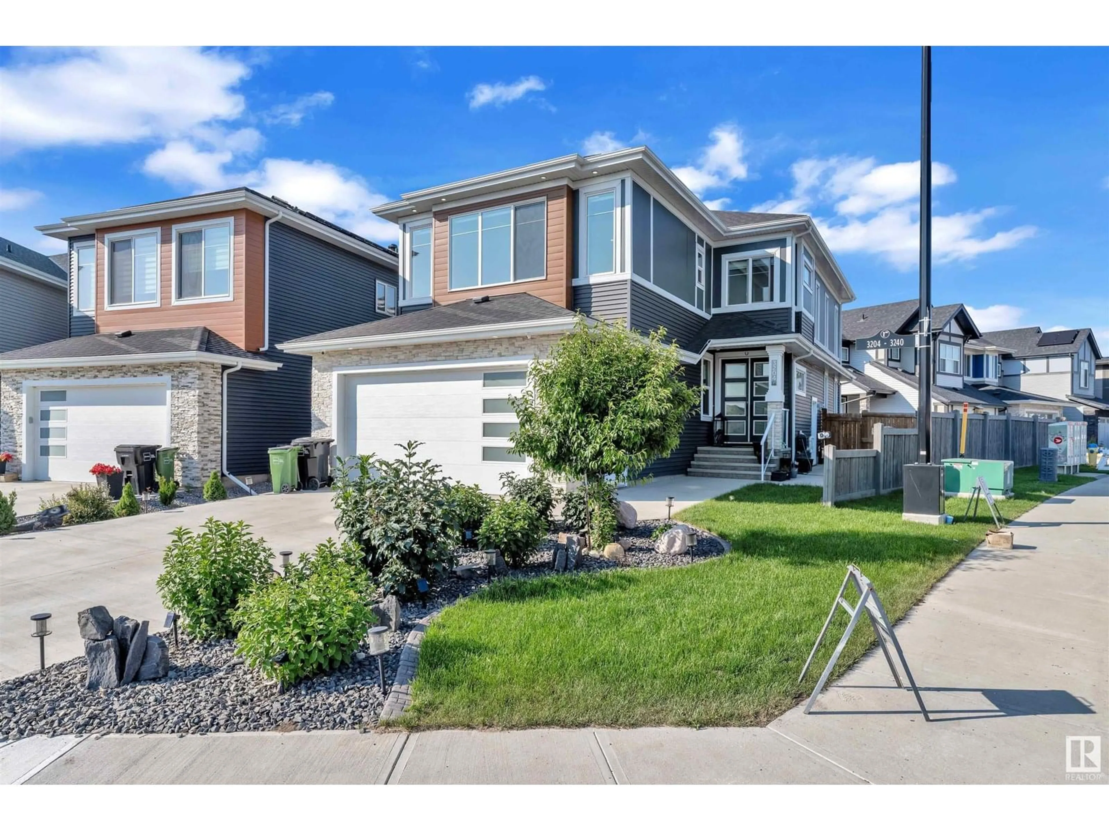 Home with vinyl exterior material, street for SW - 3204 158 ST, Edmonton Alberta T6W5C9