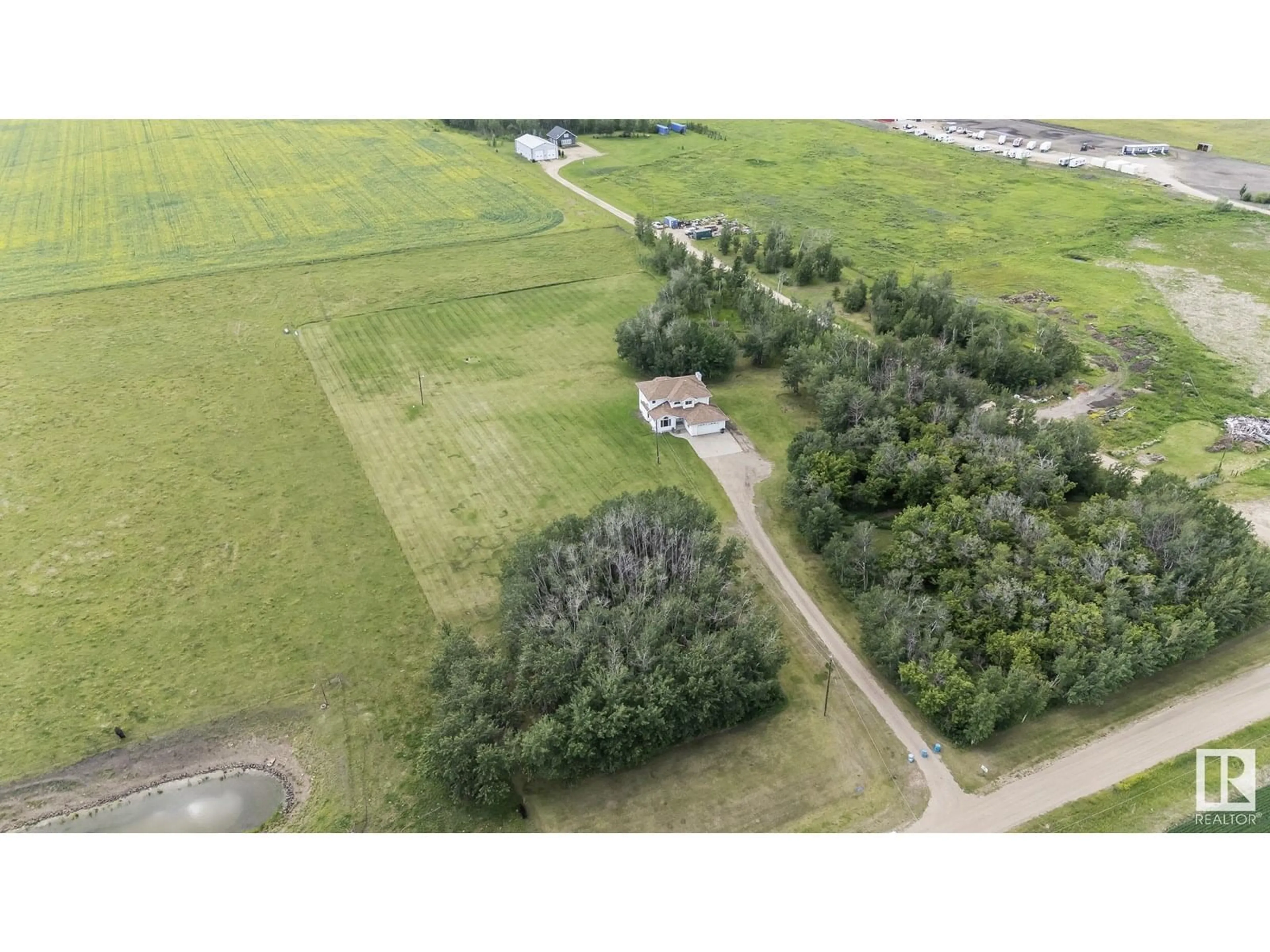 A pic from outside/outdoor area/front of a property/back of a property/a pic from drone, forest/trees view for 5710 70 ST, Edmonton Alberta T6X2S6