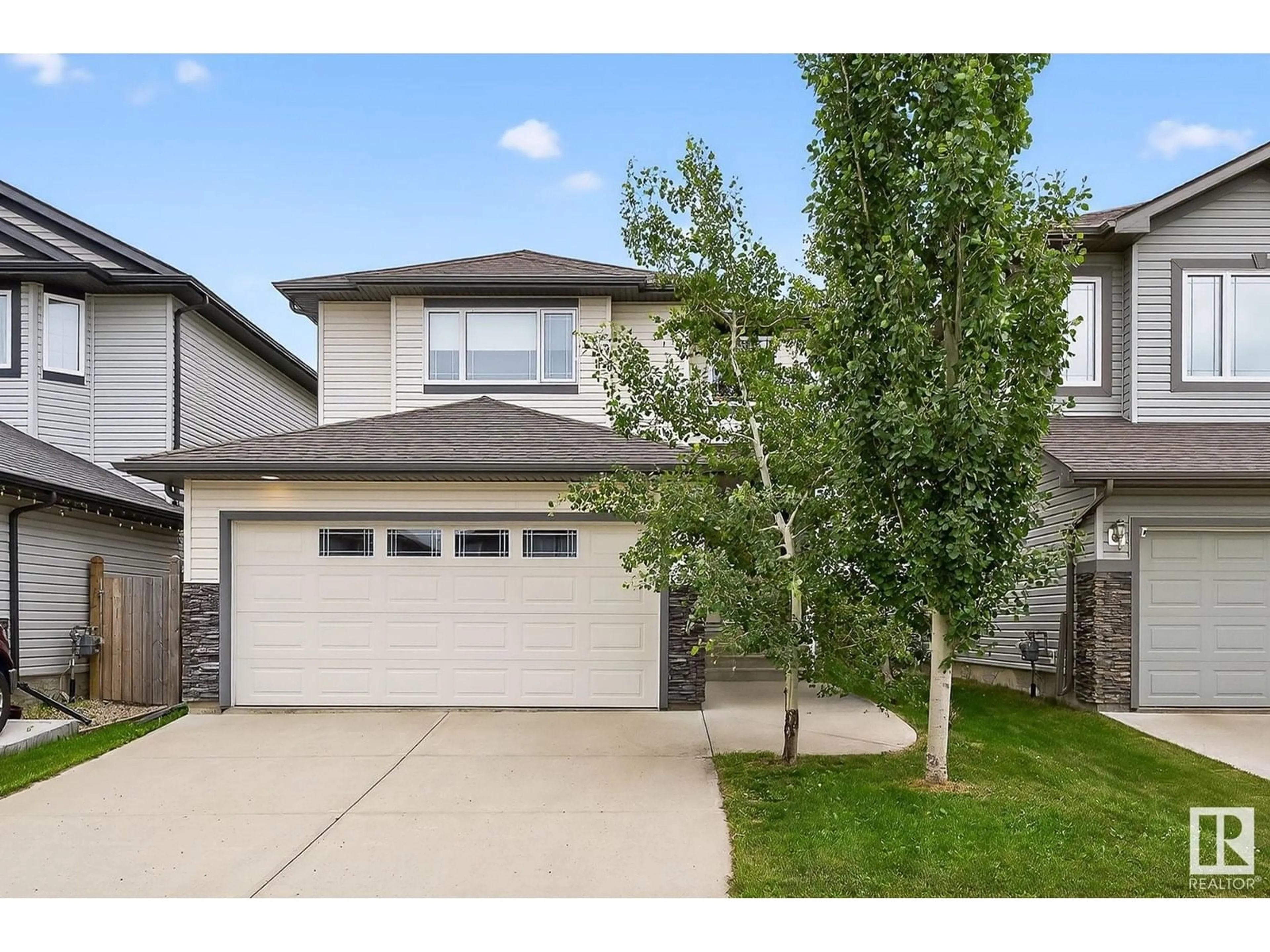 Home with vinyl exterior material, street for 13519 165 AV, Edmonton Alberta T6V0G9