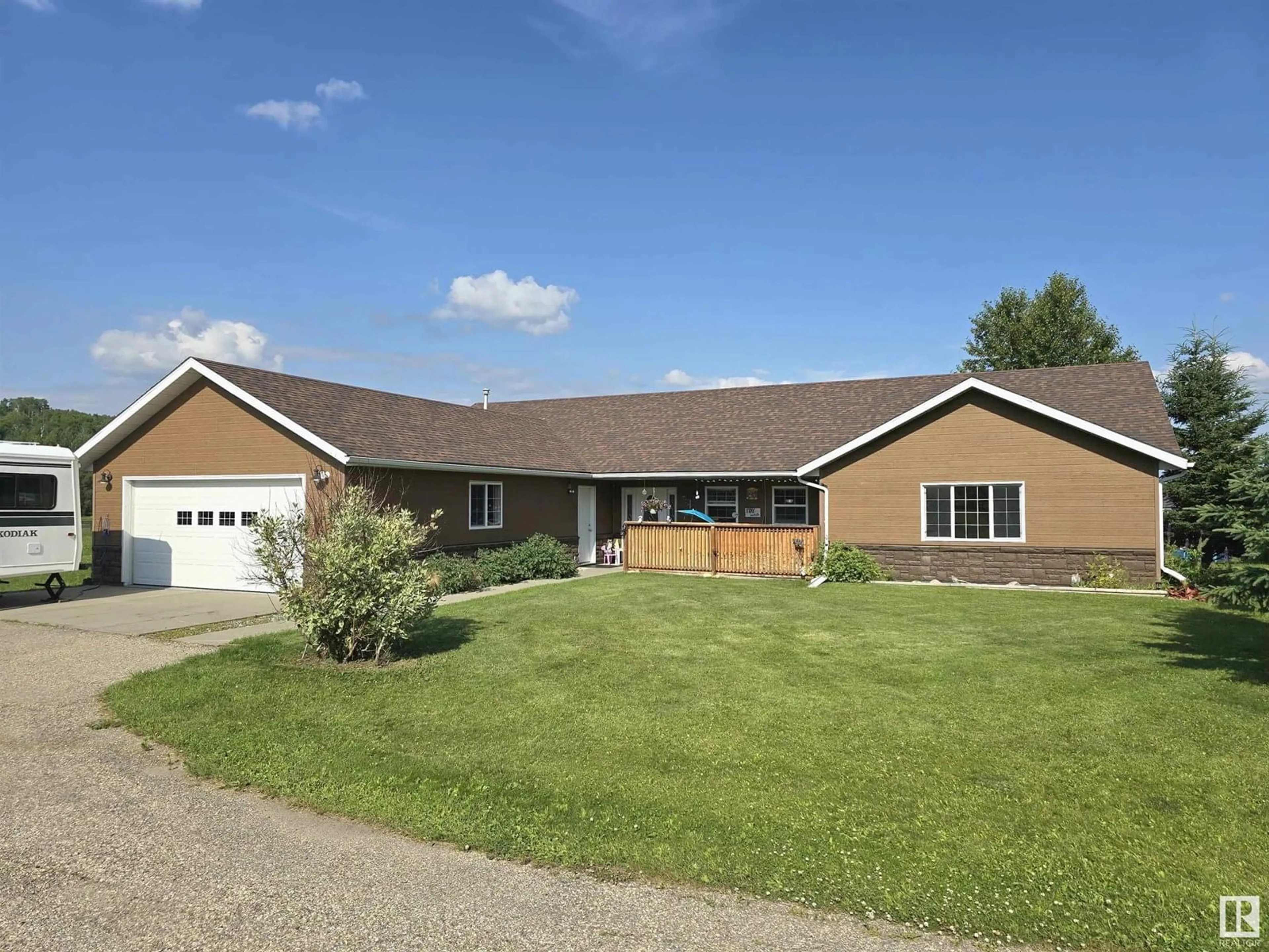 Home with vinyl exterior material, street for 124080 TWP ROAD 593 A, Rural Woodlands County Alberta T7S1P2