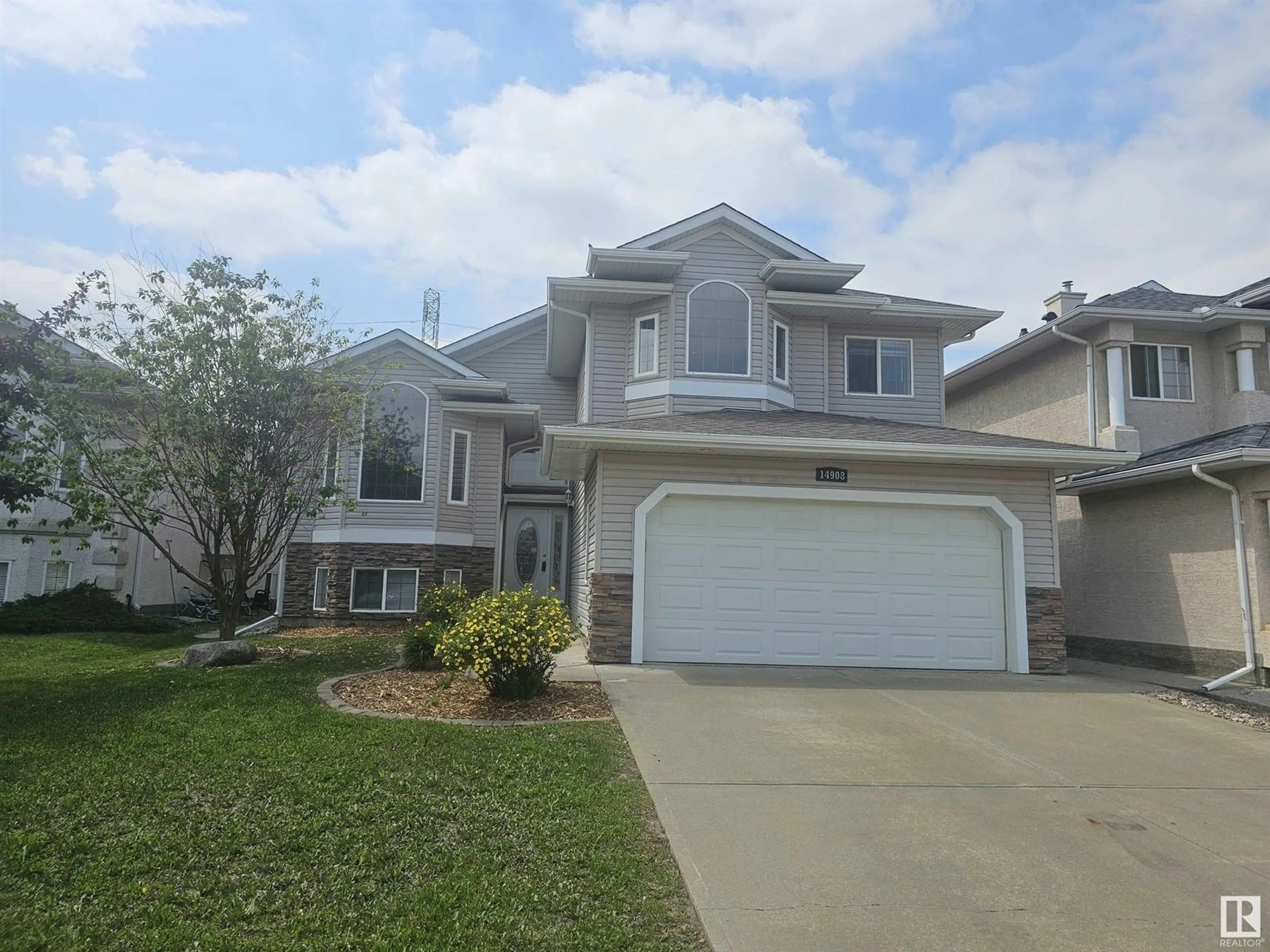 Home with vinyl exterior material, street for 14908 16 ST, Edmonton Alberta T5Y3J1