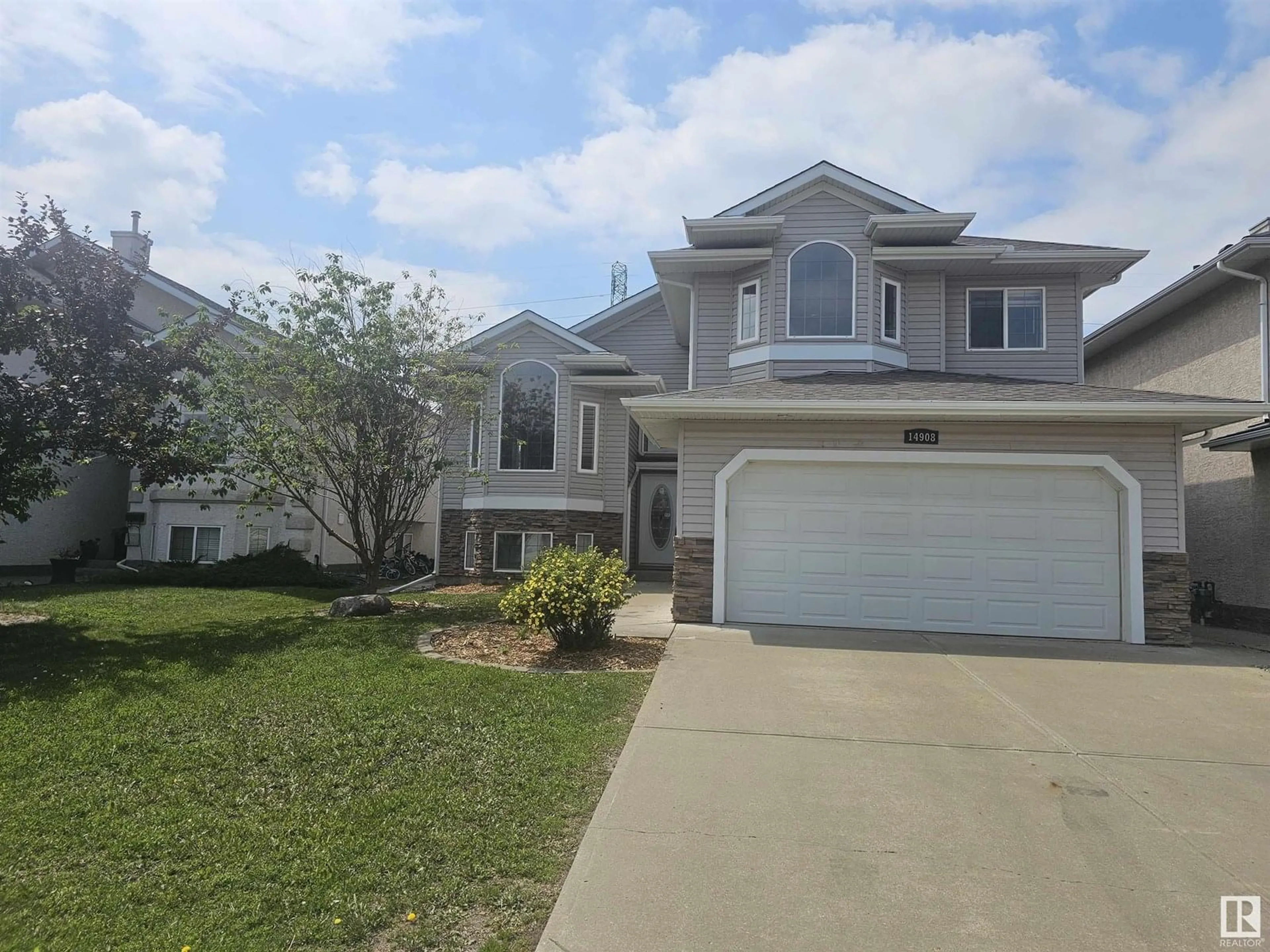 Home with vinyl exterior material, street for 14908 16 ST, Edmonton Alberta T5Y3J1