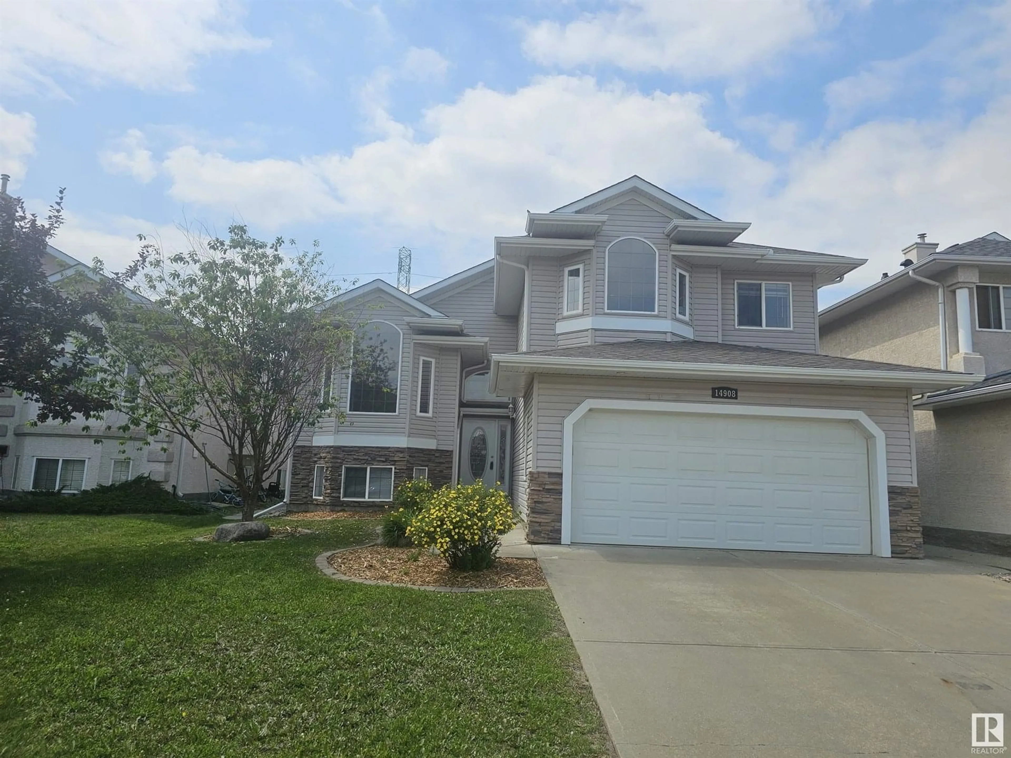 Home with vinyl exterior material, street for 14908 16 ST, Edmonton Alberta T5Y3J1