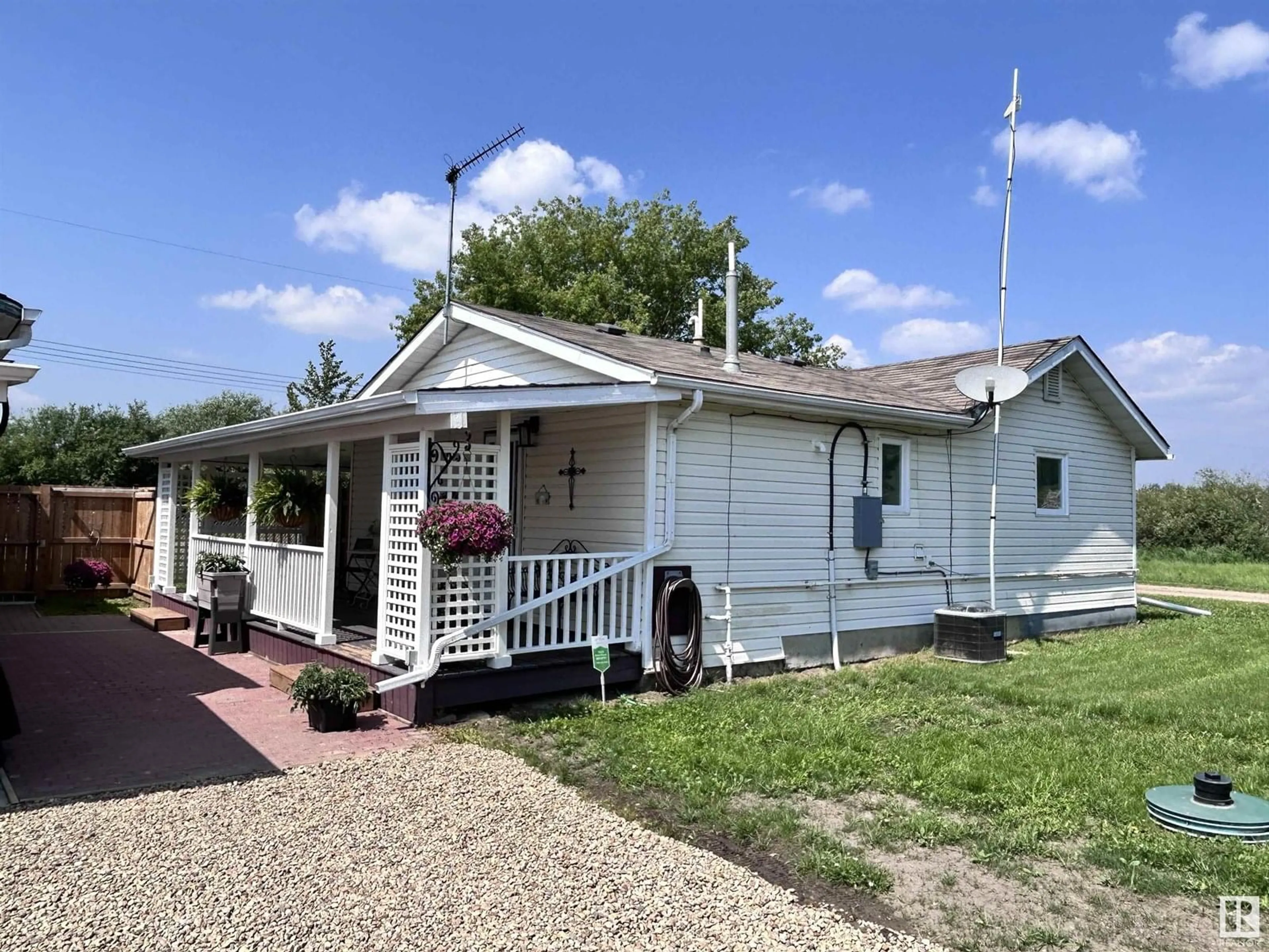 Home with vinyl exterior material, street for 5111 50 ST, Tawatinaw Alberta T0G2E0