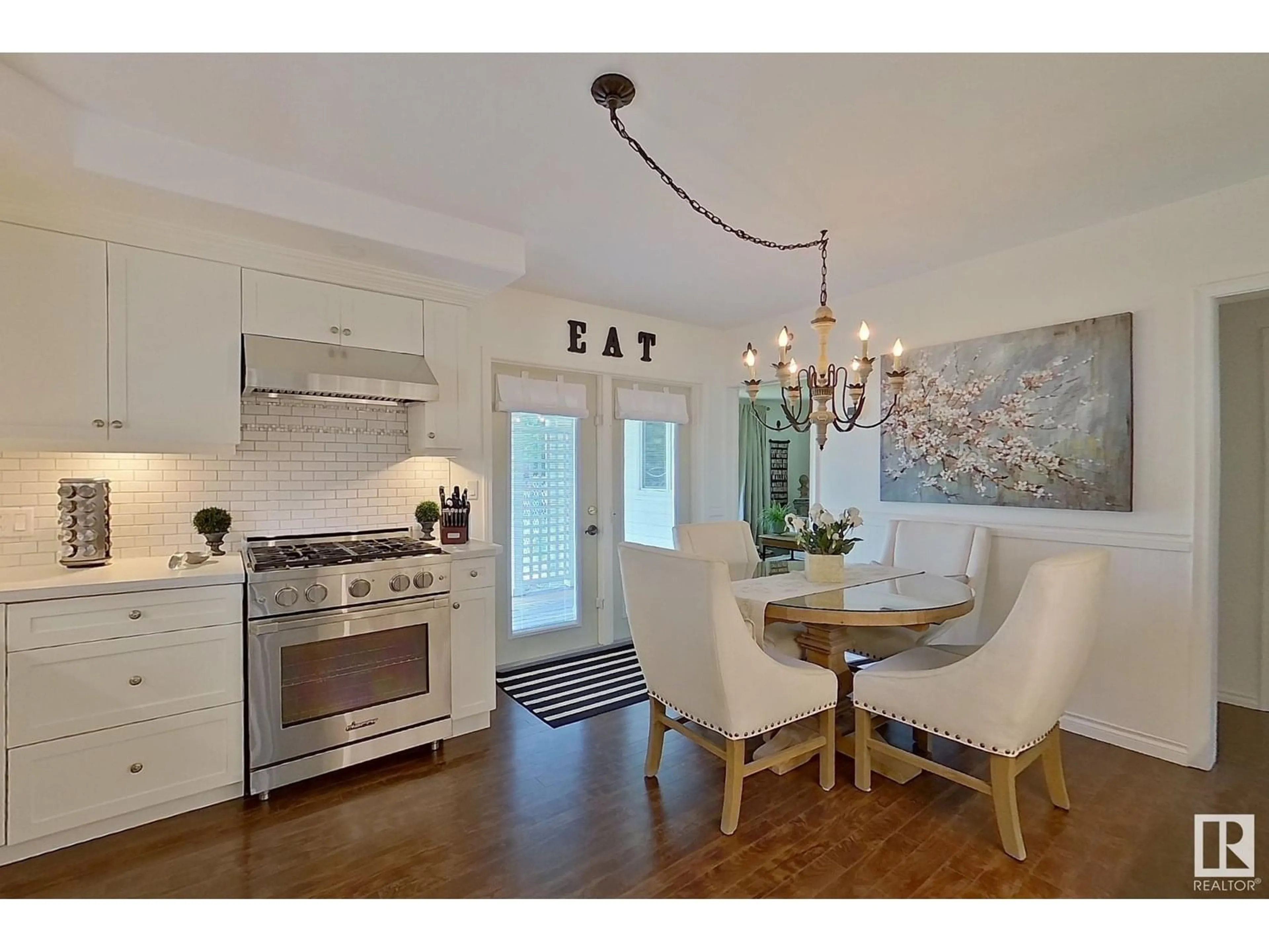 Open concept kitchen, wood/laminate floor for 5111 50 ST, Tawatinaw Alberta T0G2E0