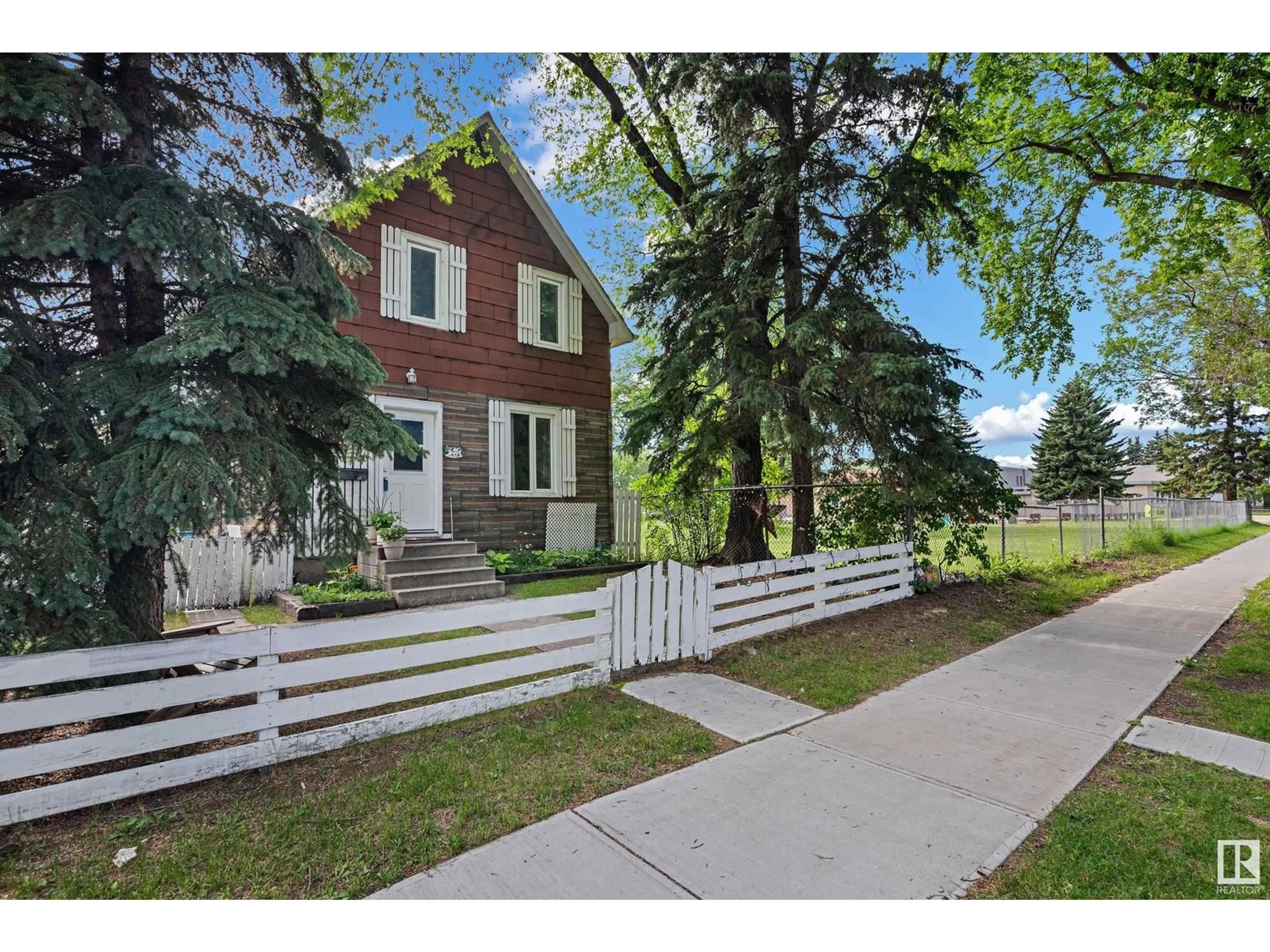 Home with brick exterior material, street for NW - 12022 95A ST, Edmonton Alberta T5G1R7