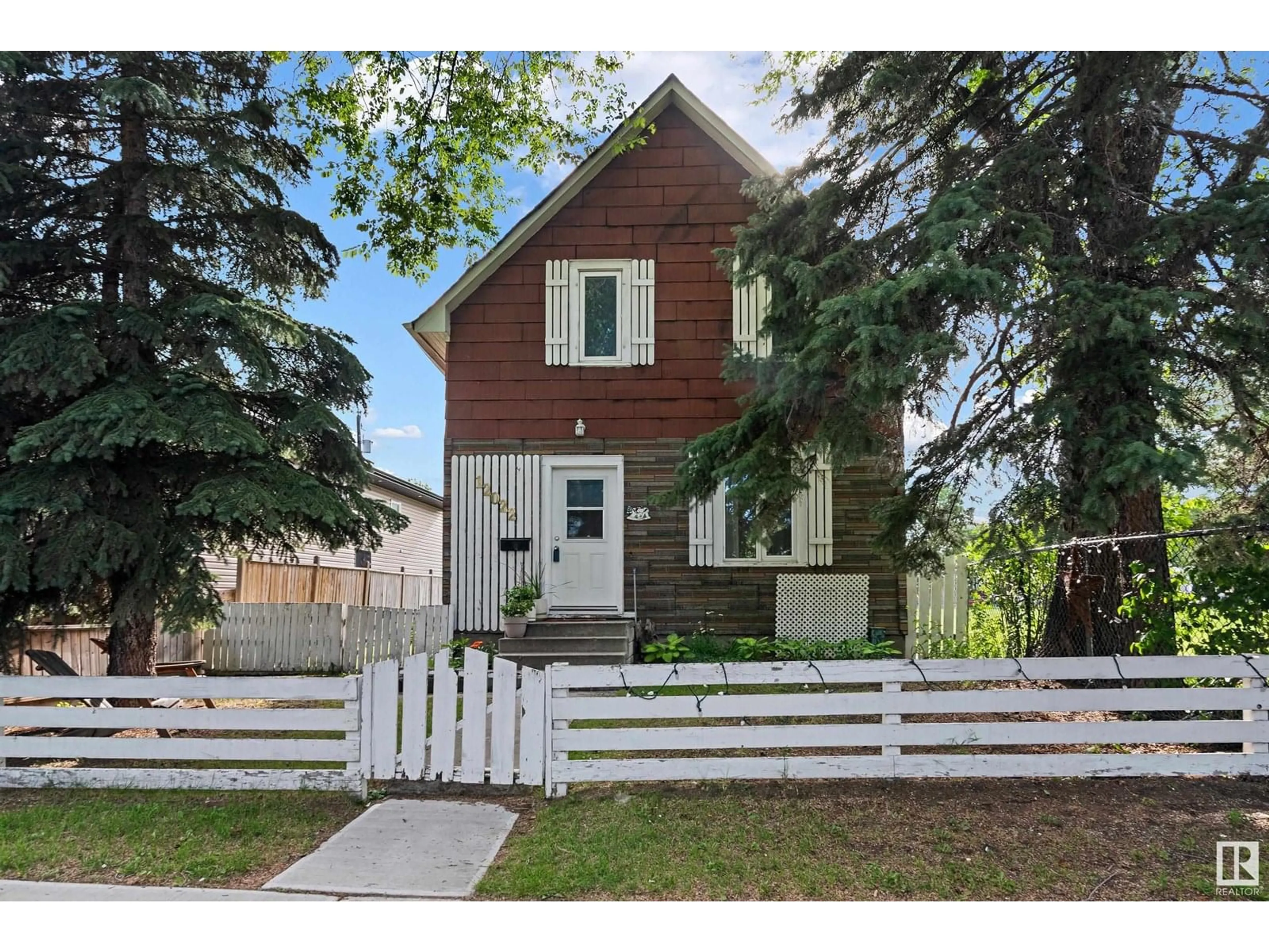 Home with vinyl exterior material, street for NW - 12022 95A ST, Edmonton Alberta T5G1R7
