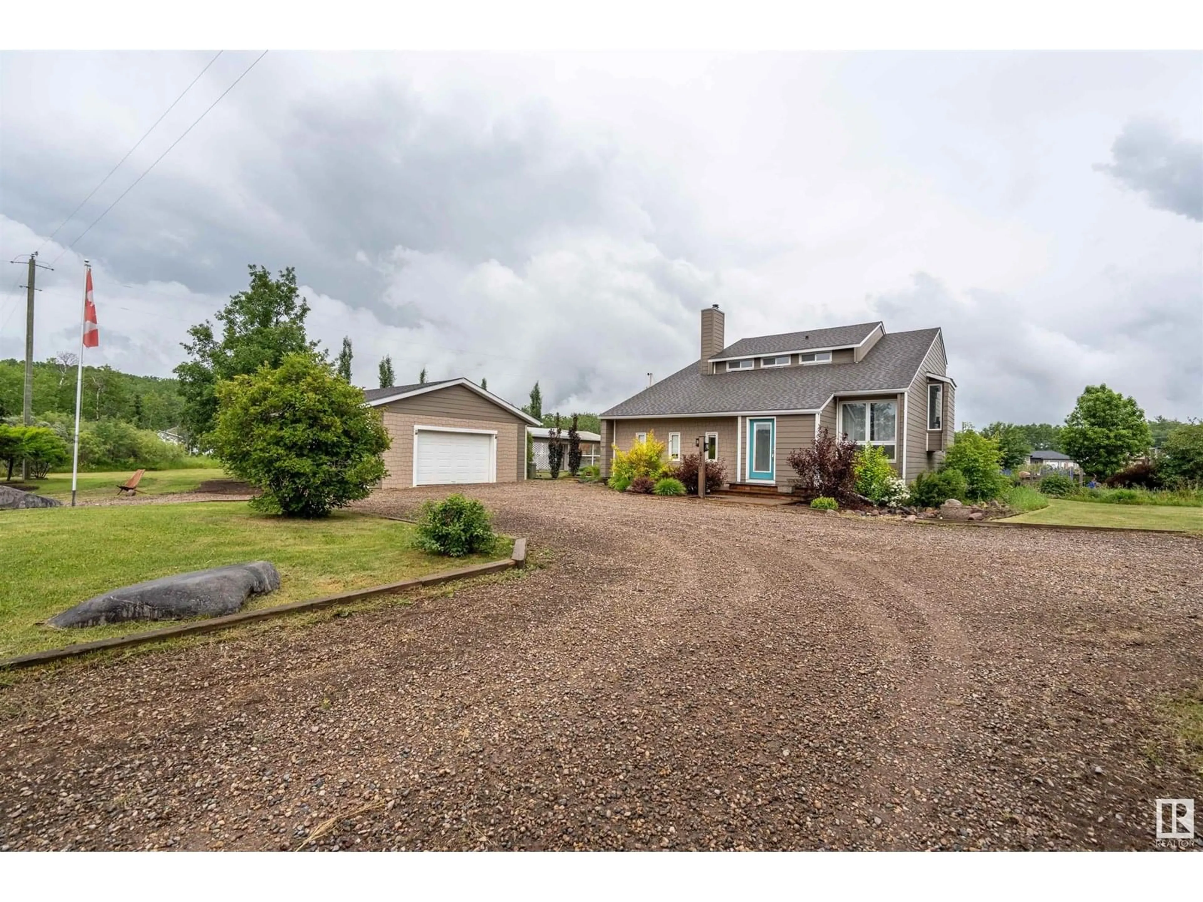 A pic from outside/outdoor area/front of a property/back of a property/a pic from drone, street for 5105 50 ST, Cherry Grove Alberta T0A0T0
