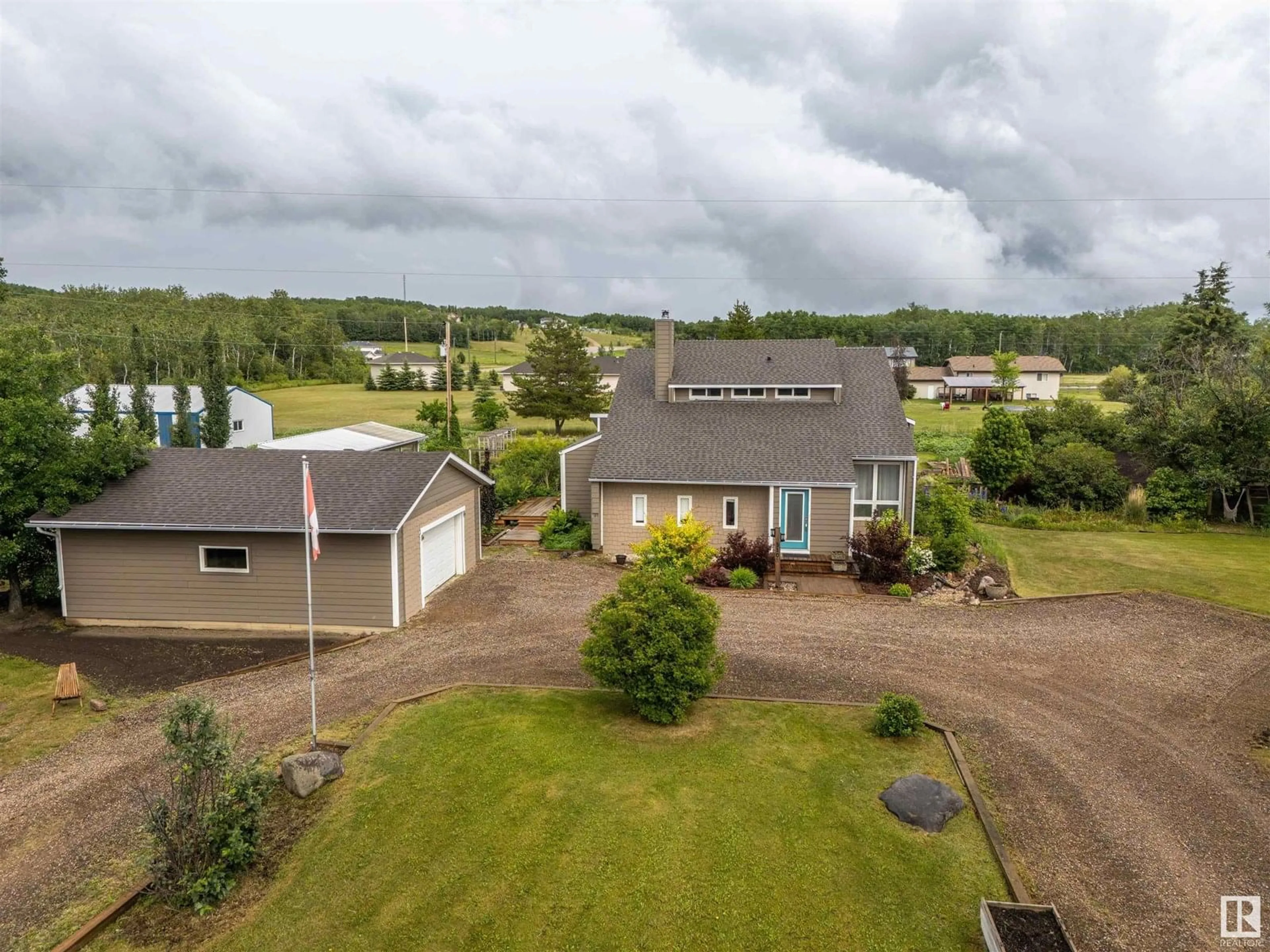 A pic from outside/outdoor area/front of a property/back of a property/a pic from drone, unknown for 5105 50 ST, Cherry Grove Alberta T0A0T0