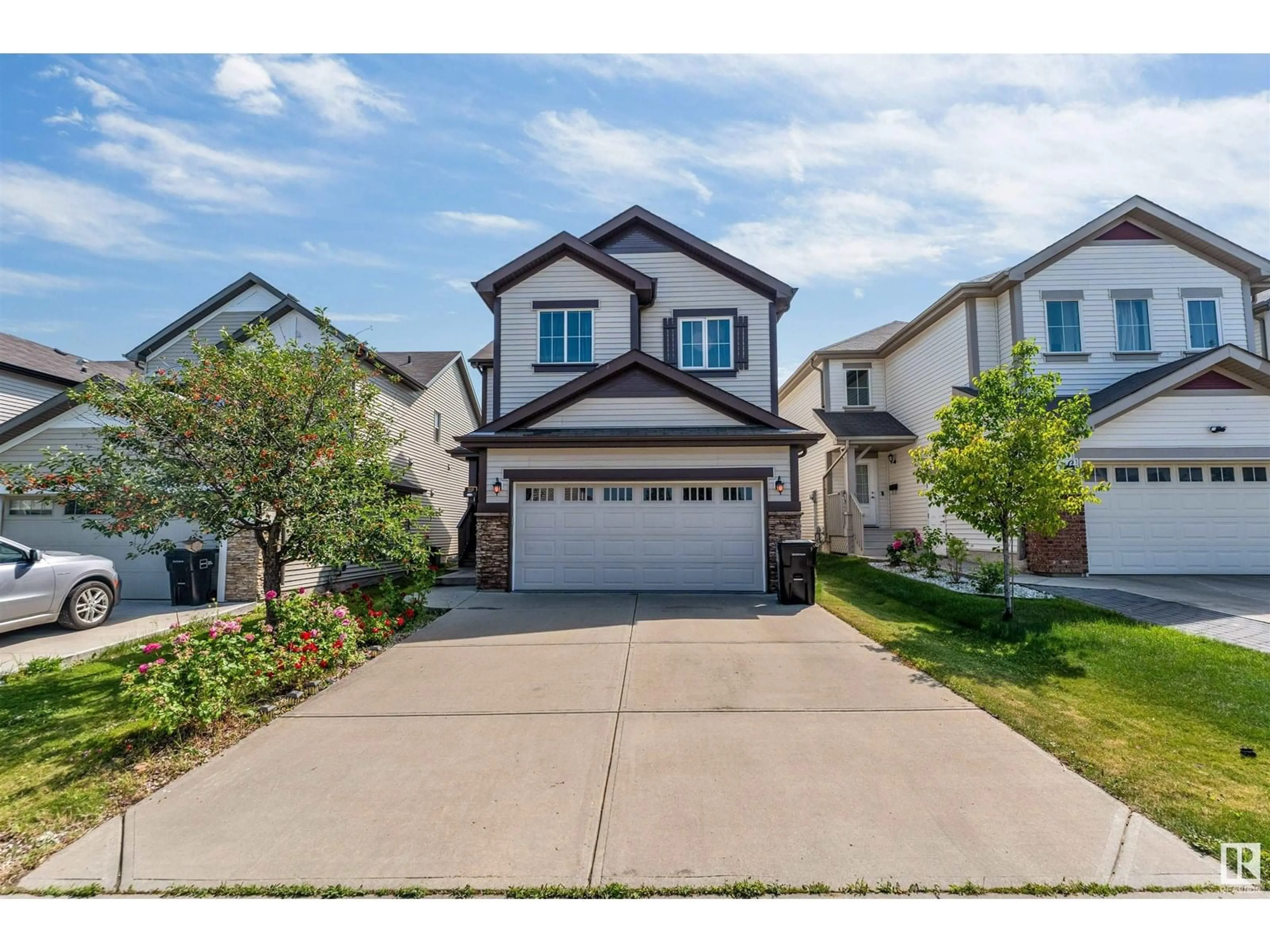 Home with vinyl exterior material, street for 1115 61 ST, Edmonton Alberta T6X0M5