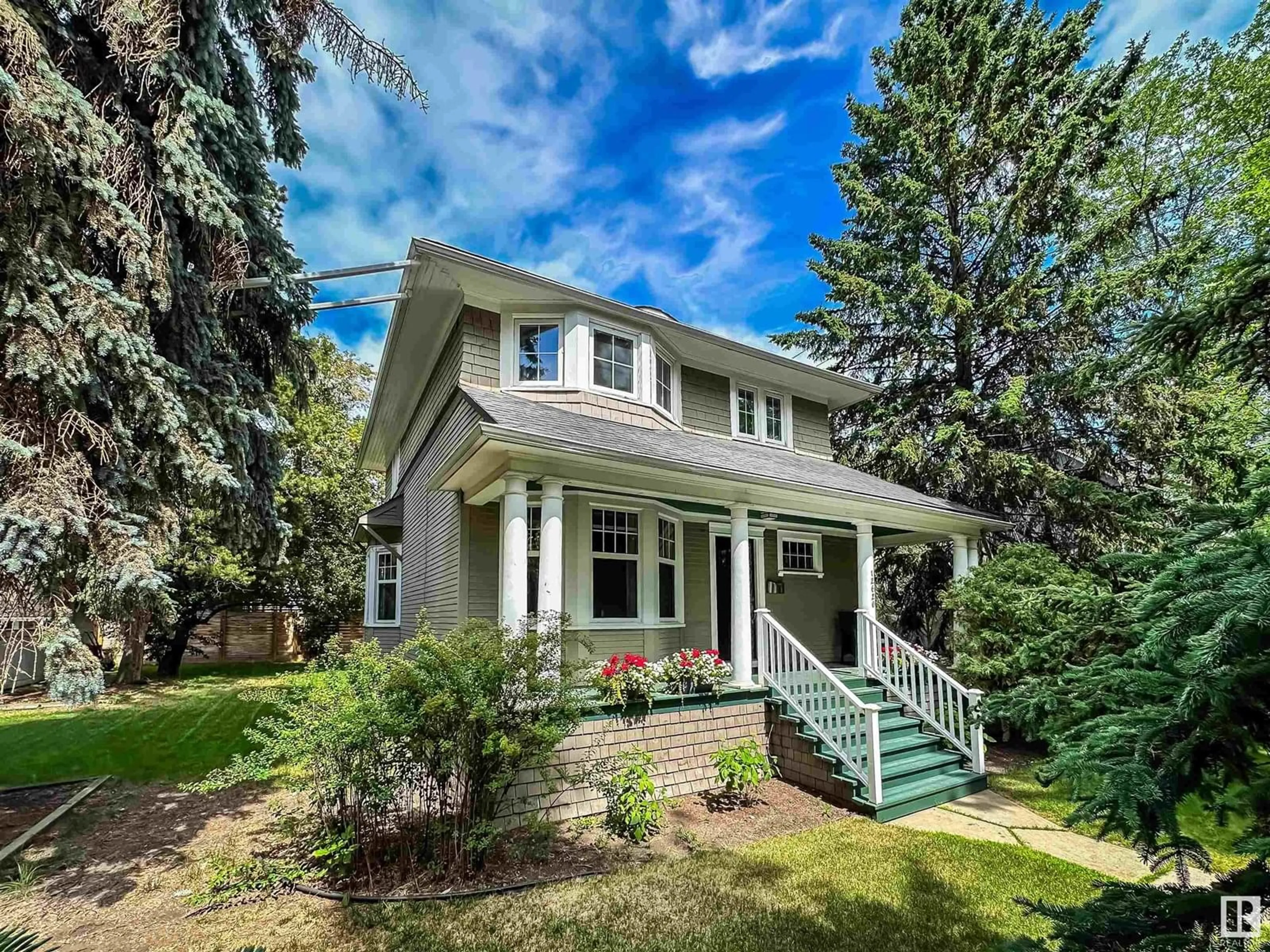 Home with vinyl exterior material, street for 12620 104 AV, Edmonton Alberta T5N0V7