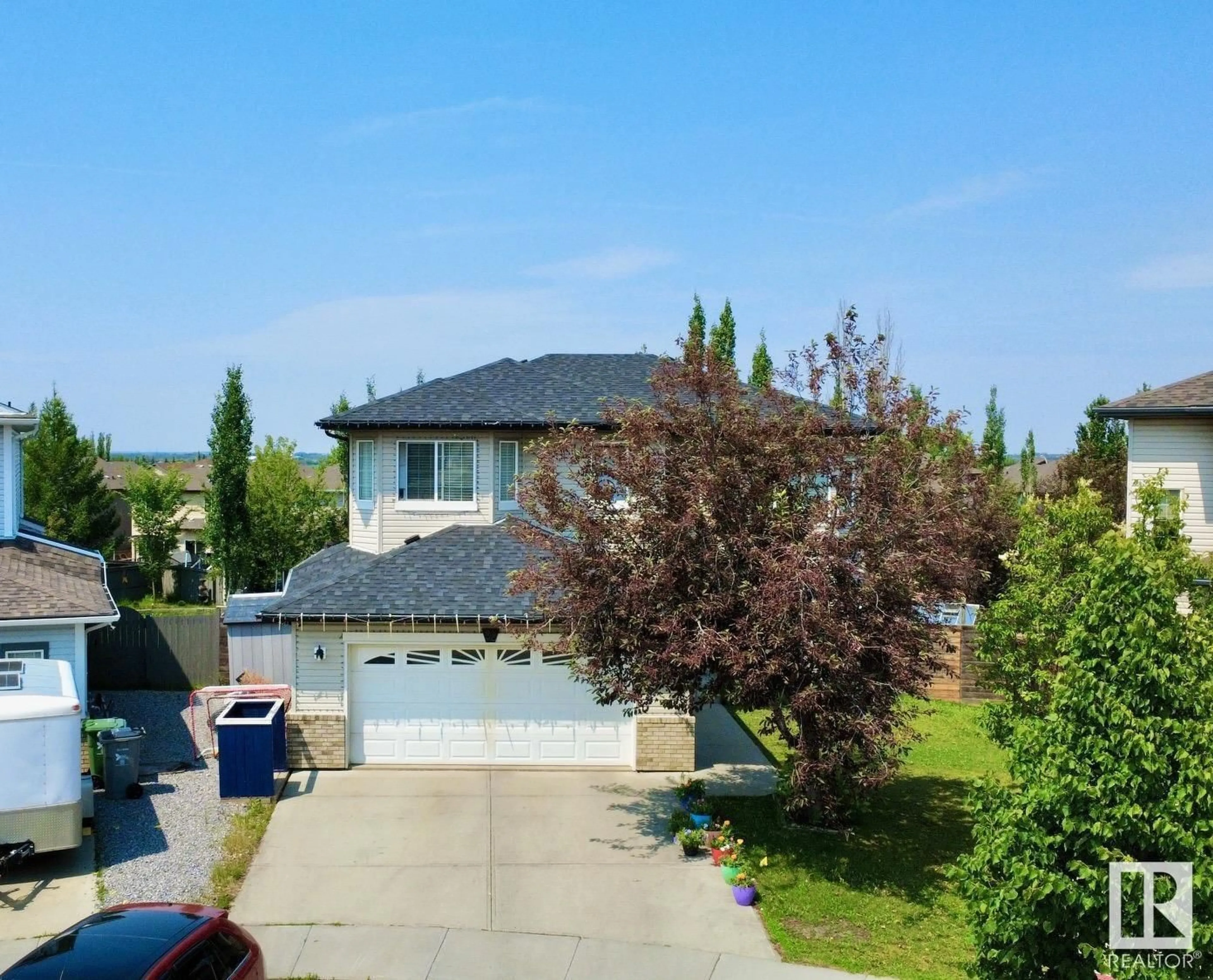 A pic from outside/outdoor area/front of a property/back of a property/a pic from drone, street for 32 CARRIERE CR, Beaumont Alberta T4X0A8